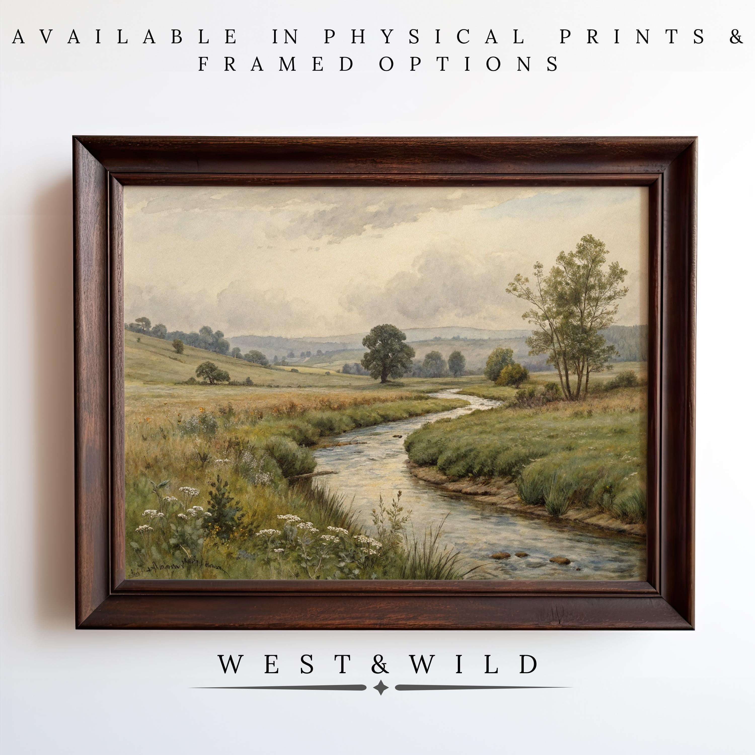 Bring the beauty of nature home with the Wildflower Wall Art – Prairie Meadow Painting. This botanical wall decor features a serene river, grassy fields, wildflowers, and distant hills. Available as prints or framed. Text: West & Wild.