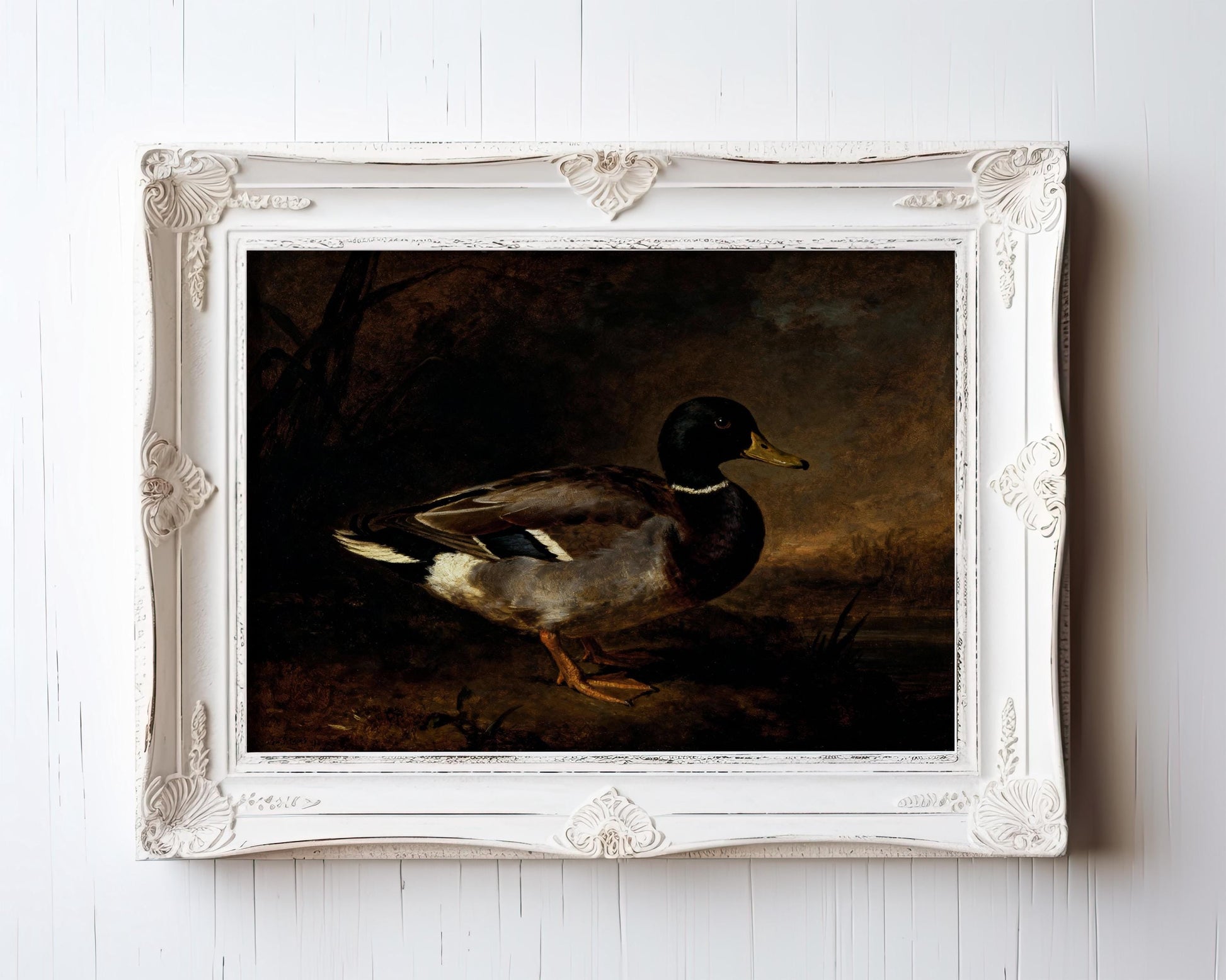 A painting of a duck in a white frame, set against a dark background.