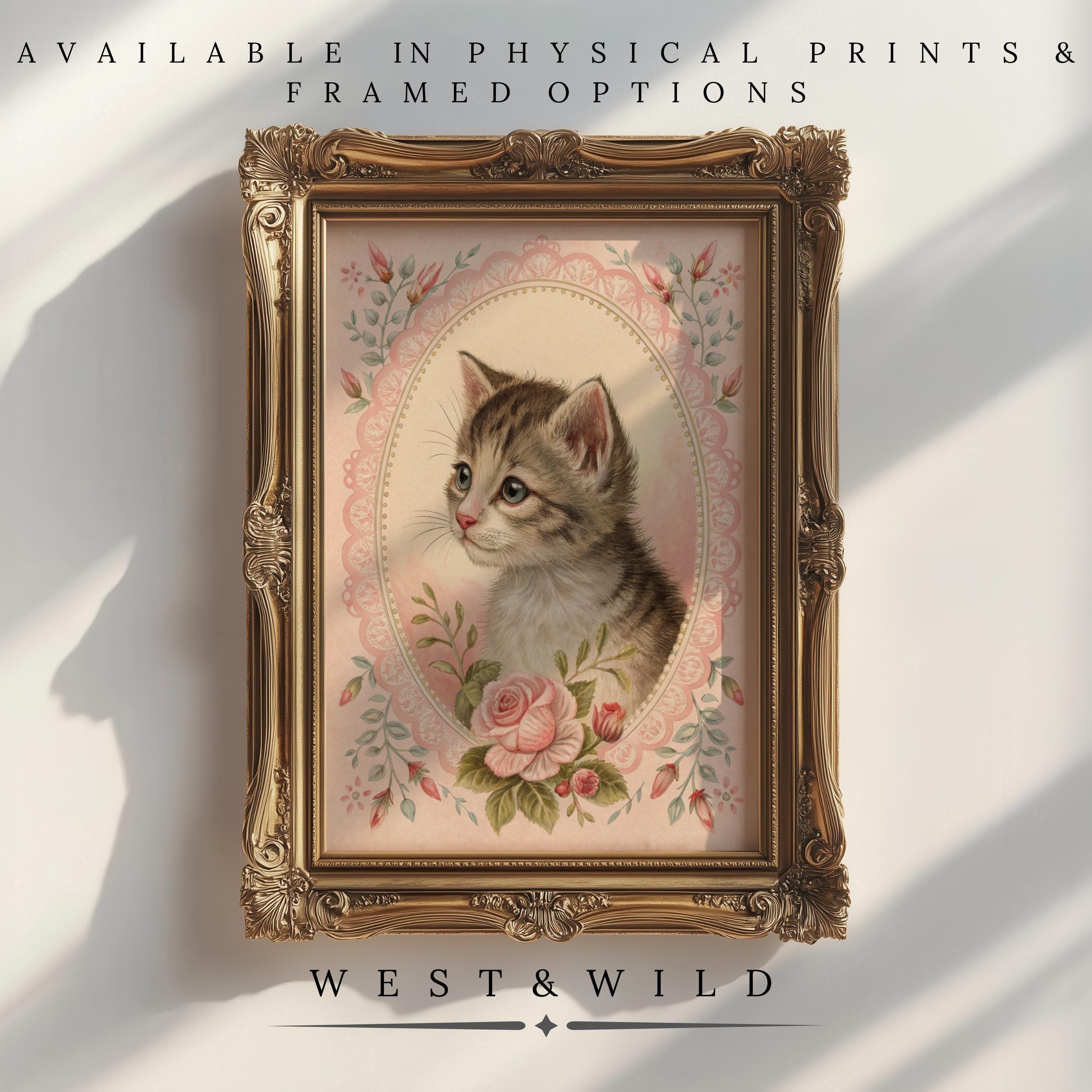 Framed nursery print featuring a vintage-style tabby kitten among pink roses. Cute Kitten Art | Victorian Wall Posters - Framed Nursery Prints With Pink Decor. Available as physical prints & framed options. West & Wild.