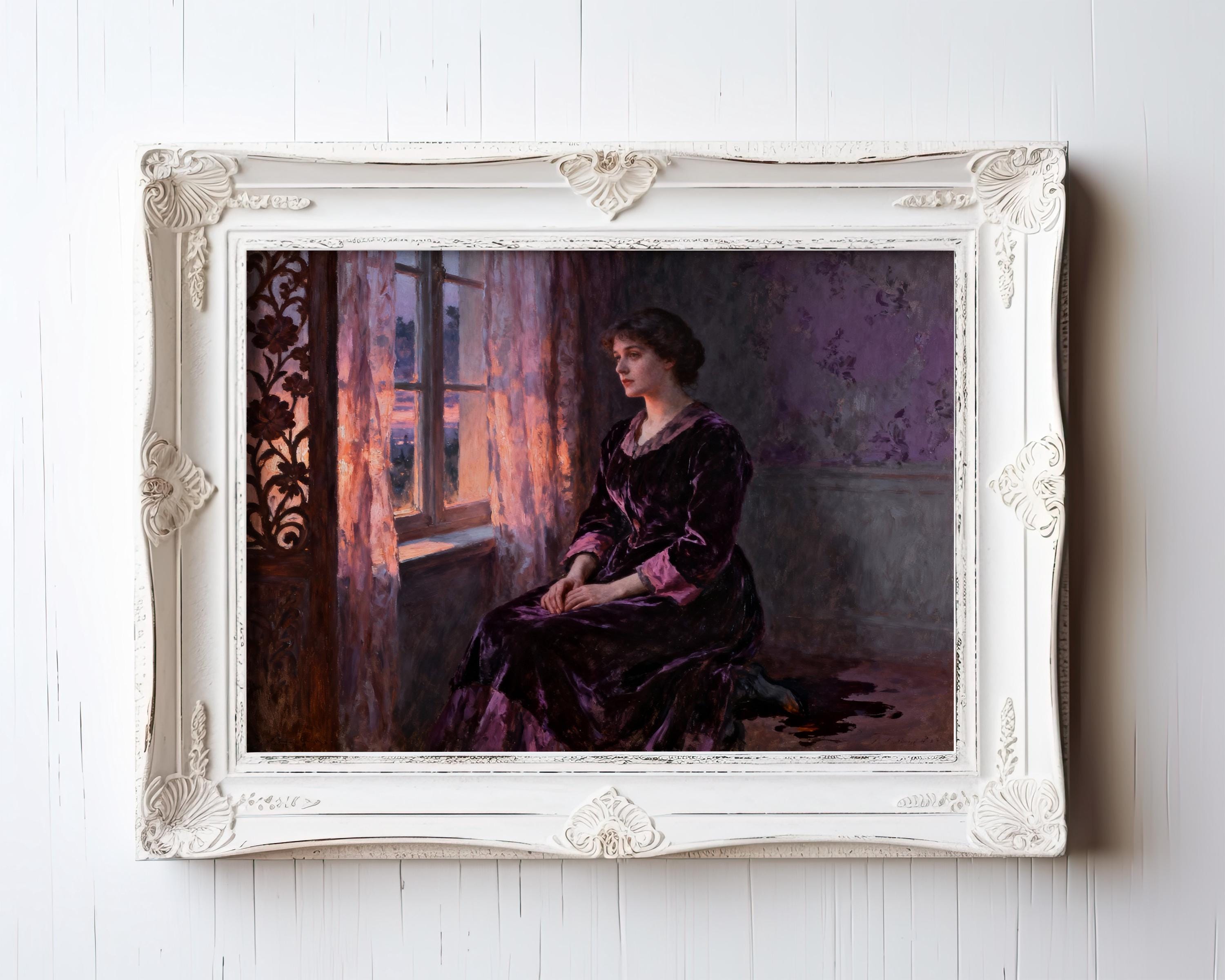 A woman in a purple dress is sitting by a window, gazing out at the sunset.