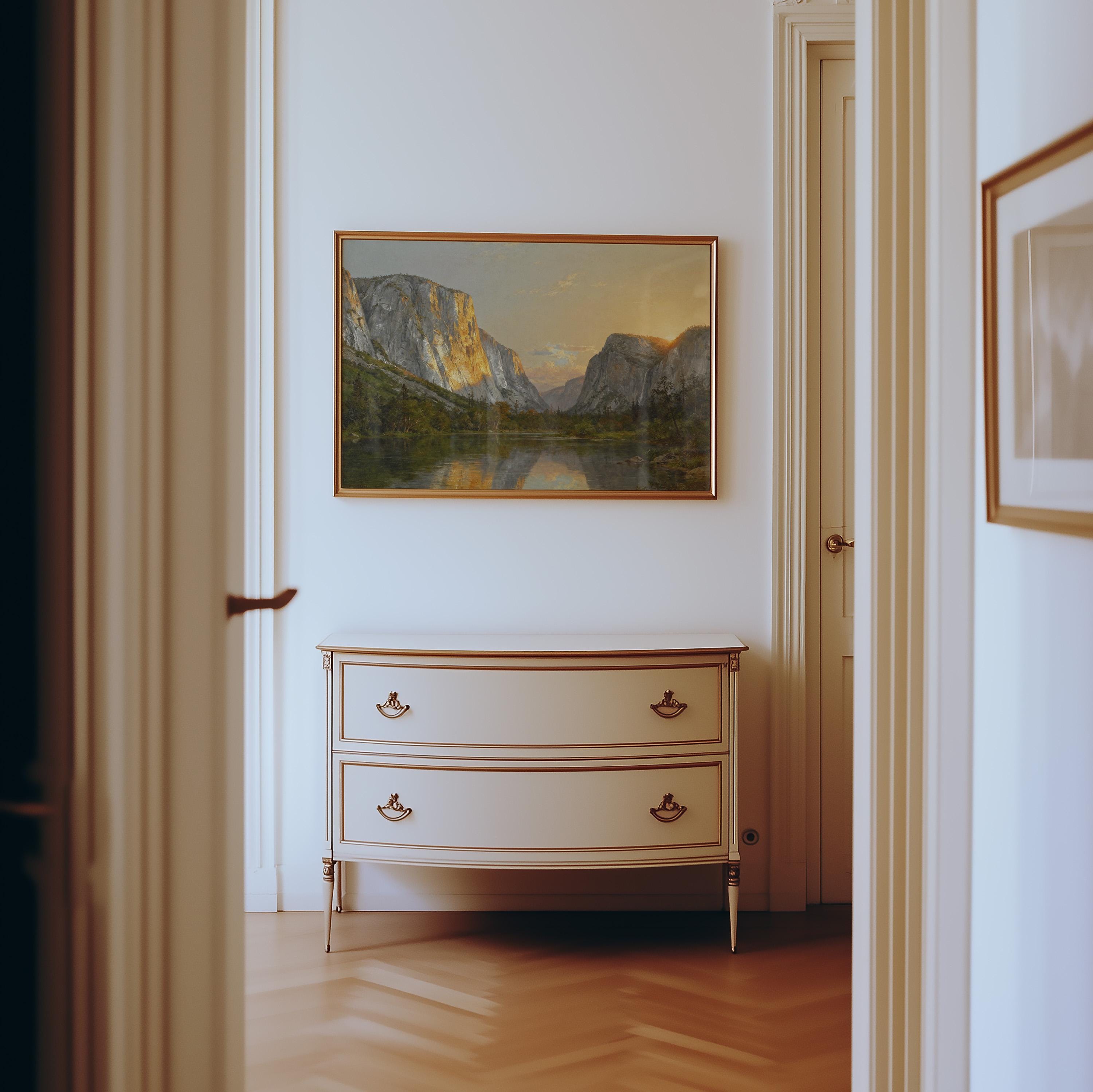 a hallway with a white dresser and a framed landscape painting hanging on the wall above it.