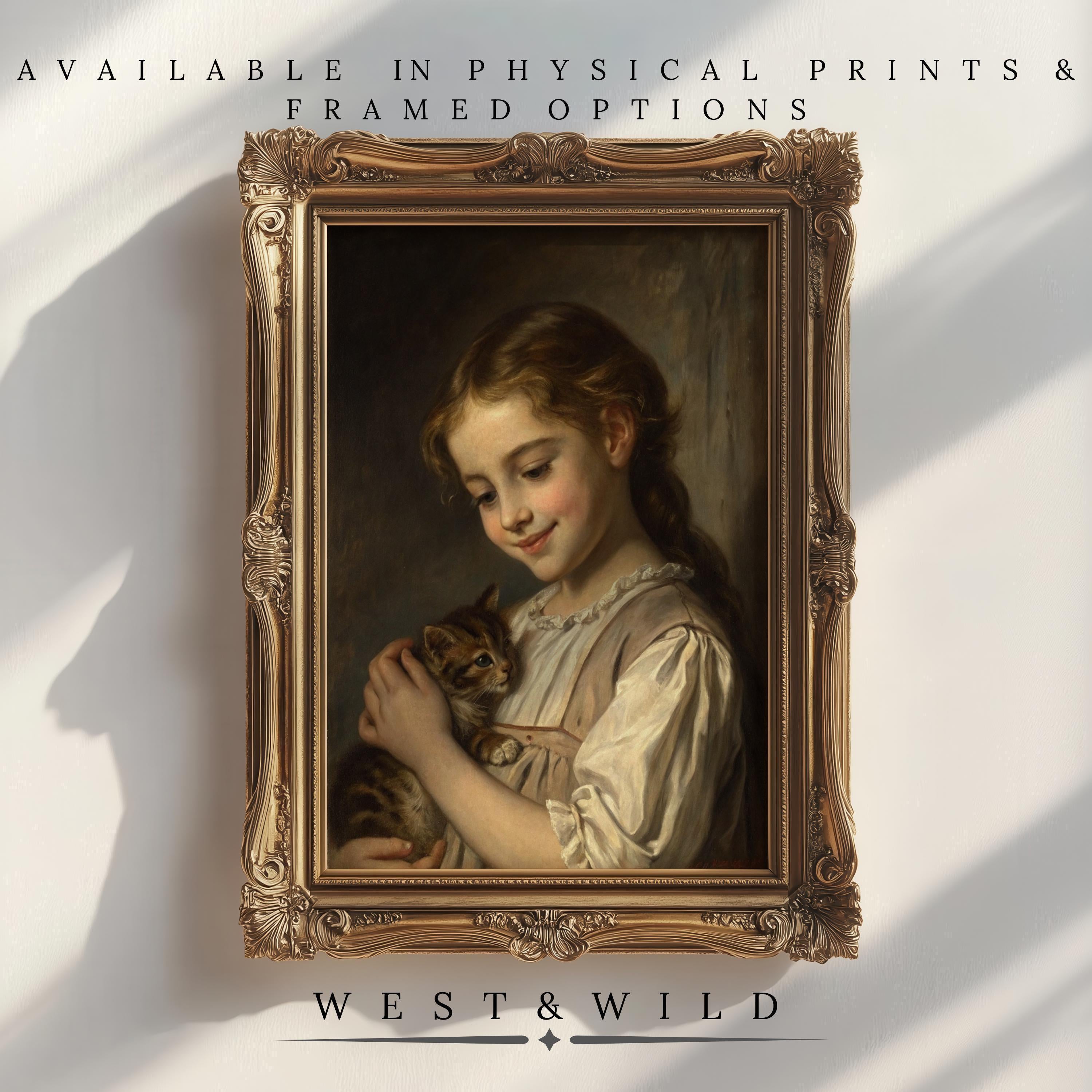 A framed print of a young girl holding a kitten on a light background. Text: “Available in archival quality prints & framed options,” and below, “Girls Room Wall Art – Nostalgic Victorian Artwork Prints | West & Wild Art Archive.”.