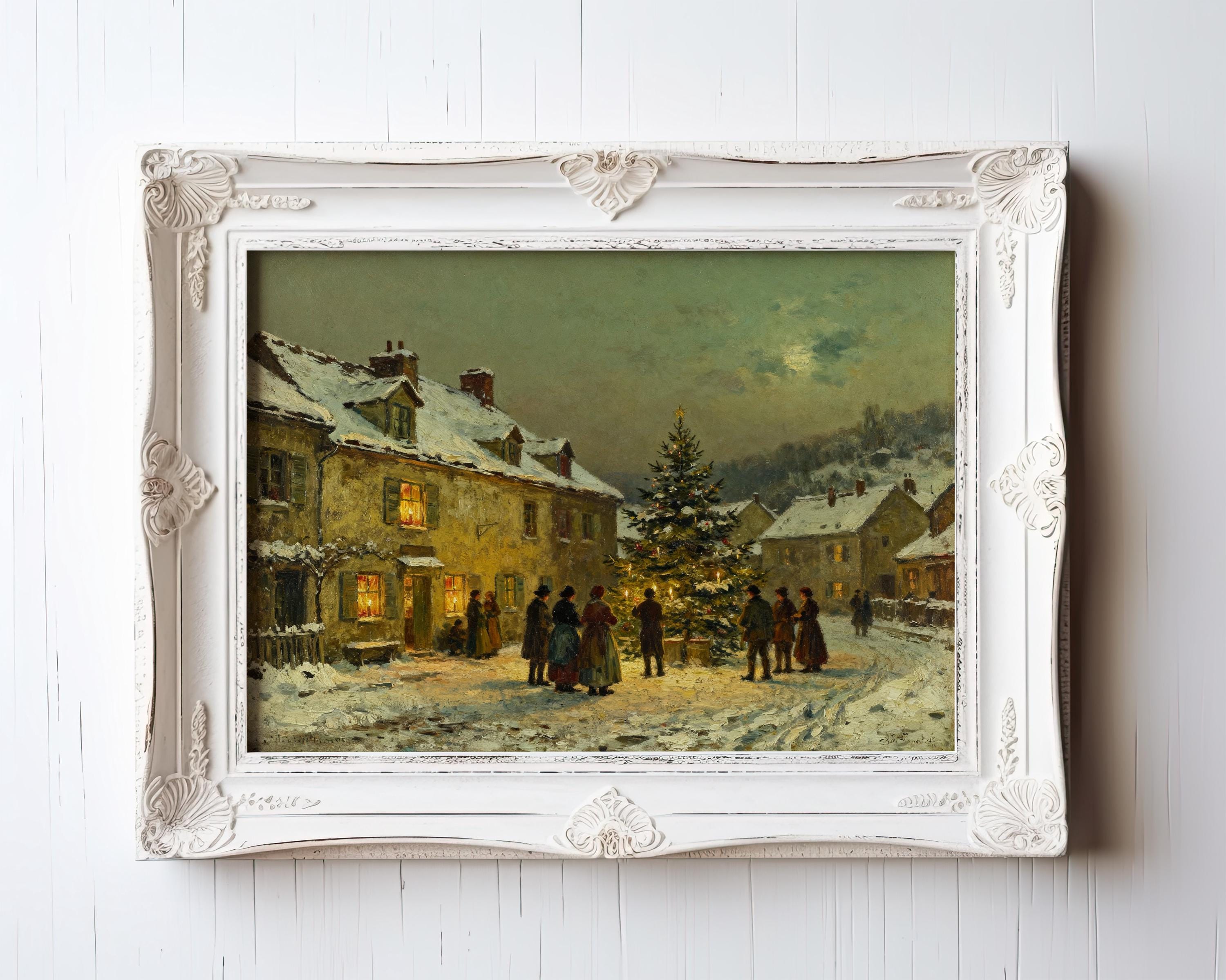 The Vintage Holiday Art Print – Rustic Winter Wall Decor features a snowy village Christmas scene with people around a tree, presented in an ornate white frame. An archival-quality piece from the West & Wild Art Archive, perfect for festive decor.