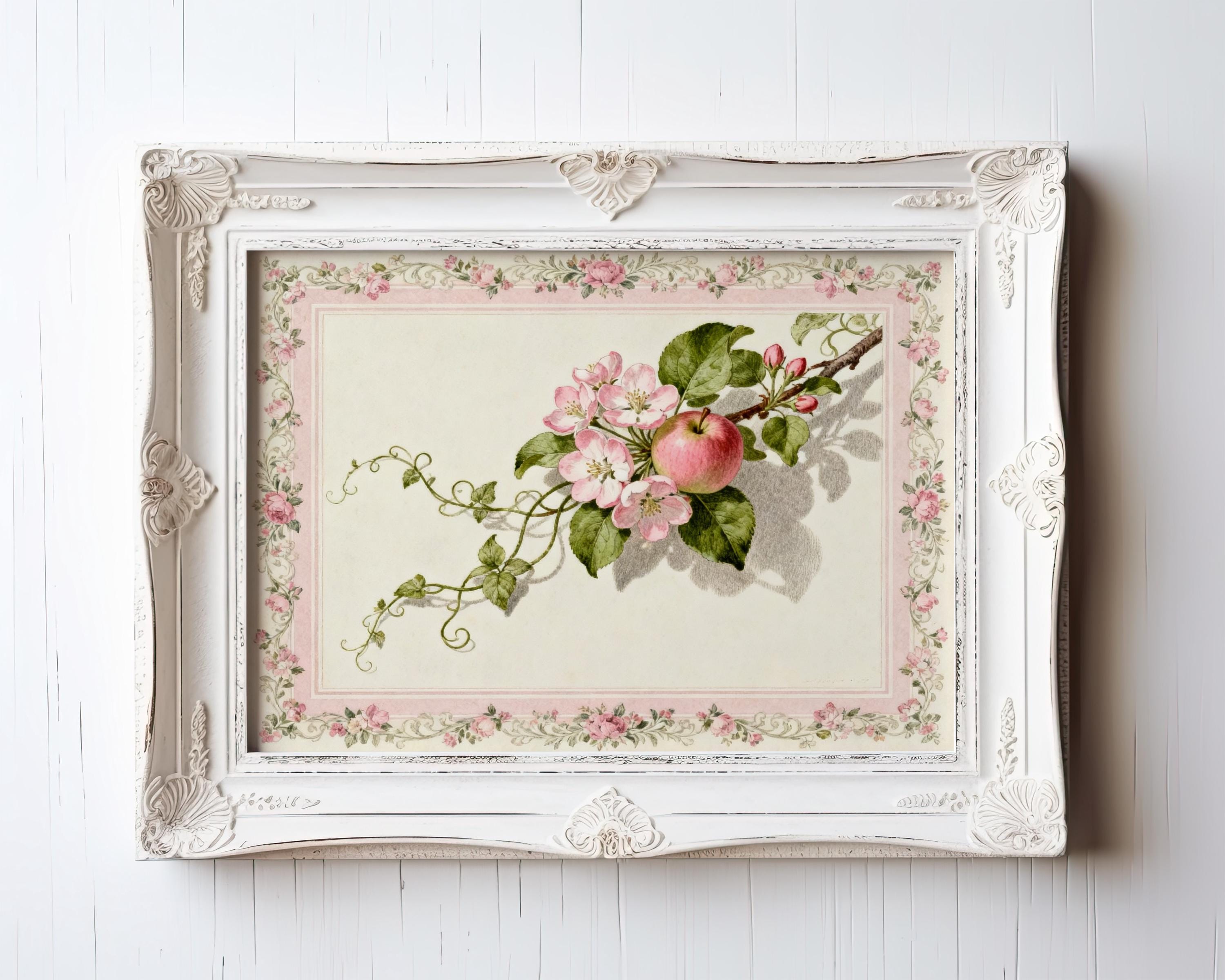 A framed painting depicting a branch with pink flowers and leaves.