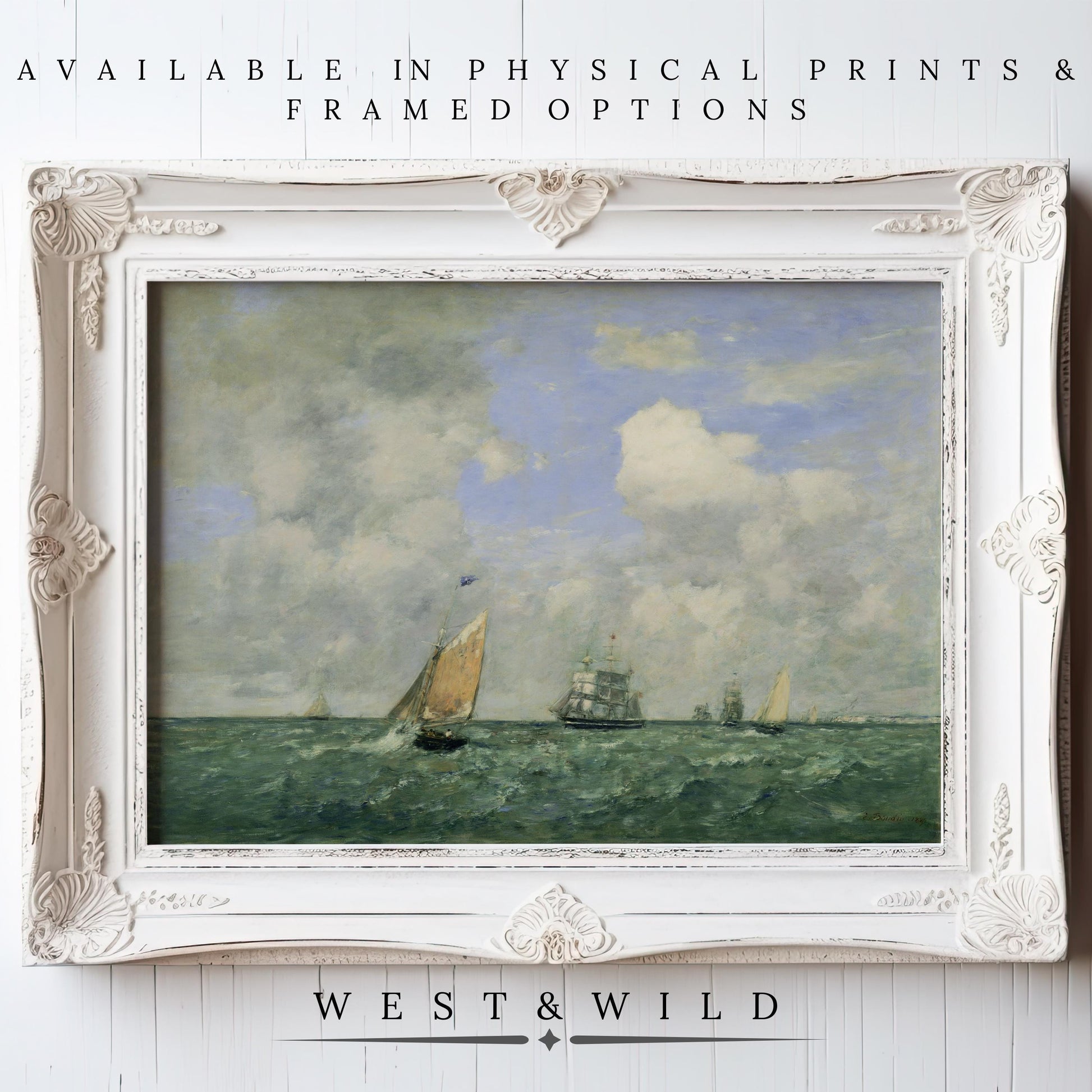 A framed "Vintage Sailing Art – Sailboat Oil Paintings" print shows sailboats on a blue-green sea under a cloudy sky, displayed on a white wall. Available in archival quality prints and framed options by West & Wild.
