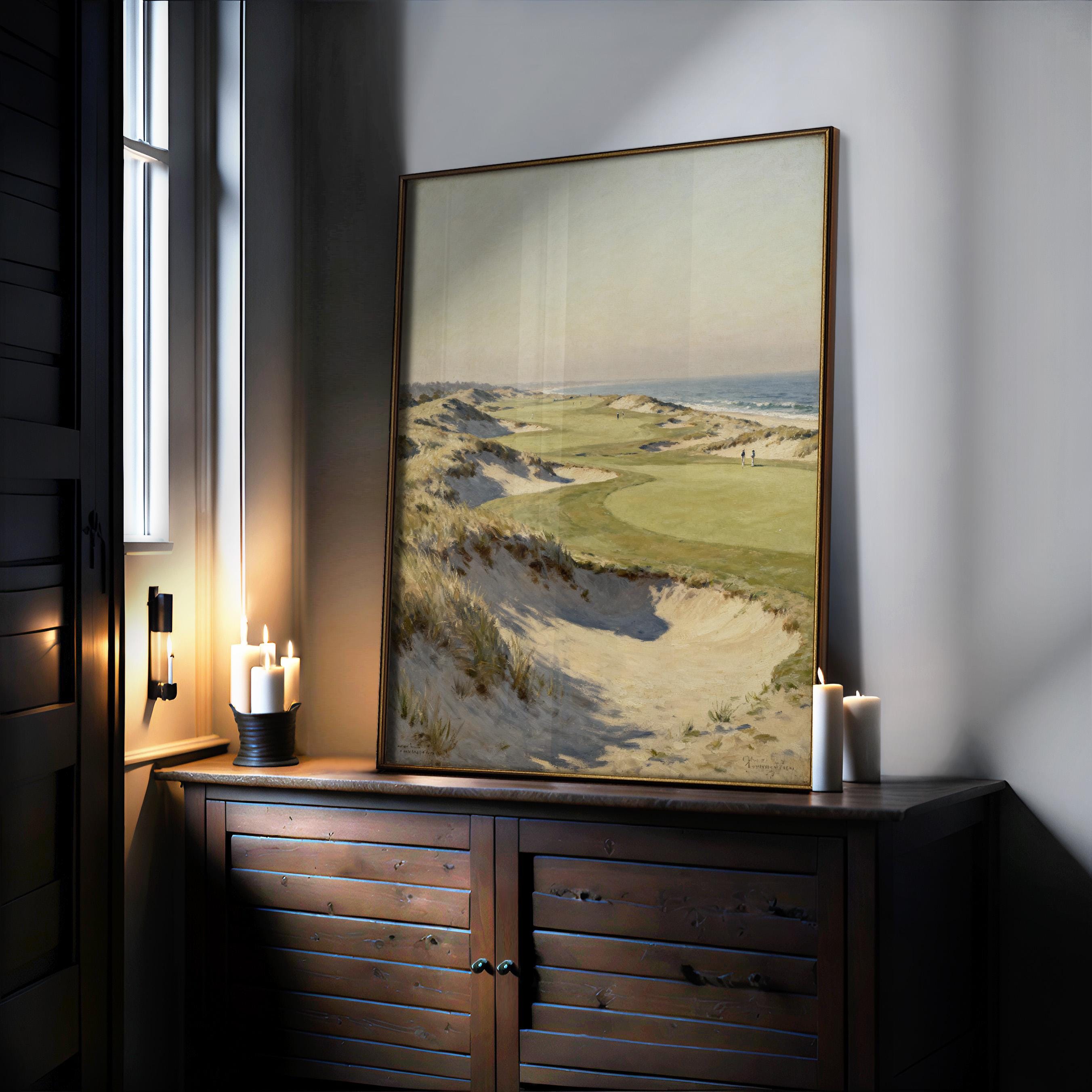 a large painting of a golf course with a desert landscape in the background, displayed on a wooden cabinet or dresser. The painting is lit by candles on the cabinet, creating a warm and inviting atmosphere.