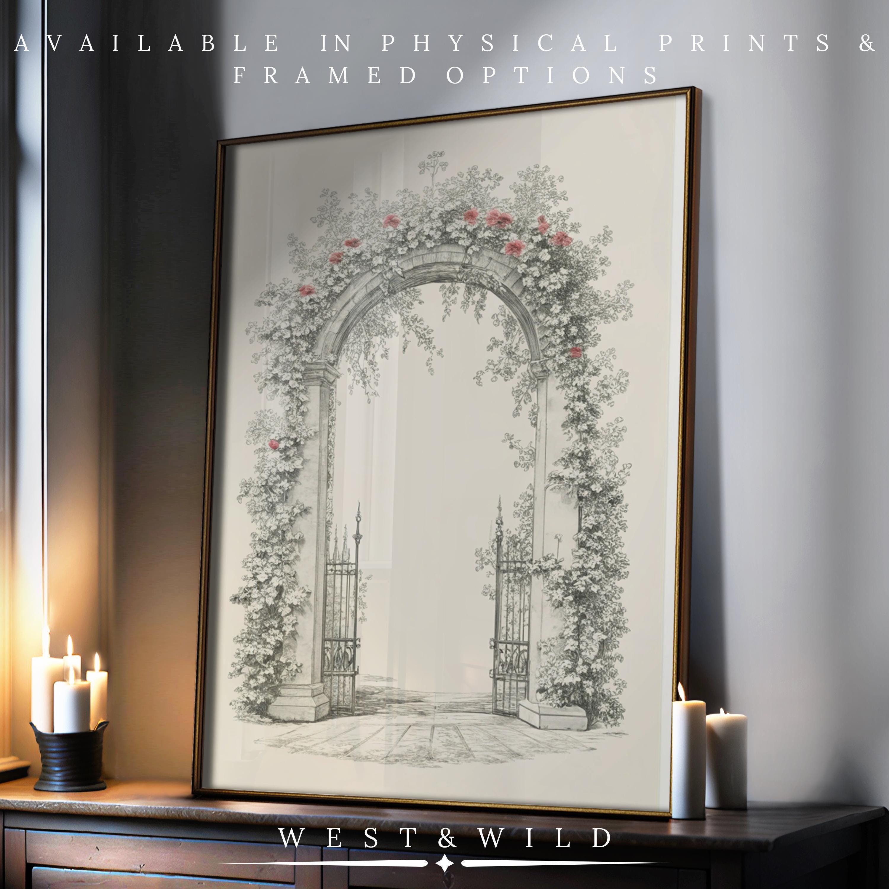 A framed Vintage Floral Garden Print – Romantic Rose Archway Art, showing an arched stone gate with vines and pink roses beside candles. Available as archival-quality vintage art prints & framed wall decor.