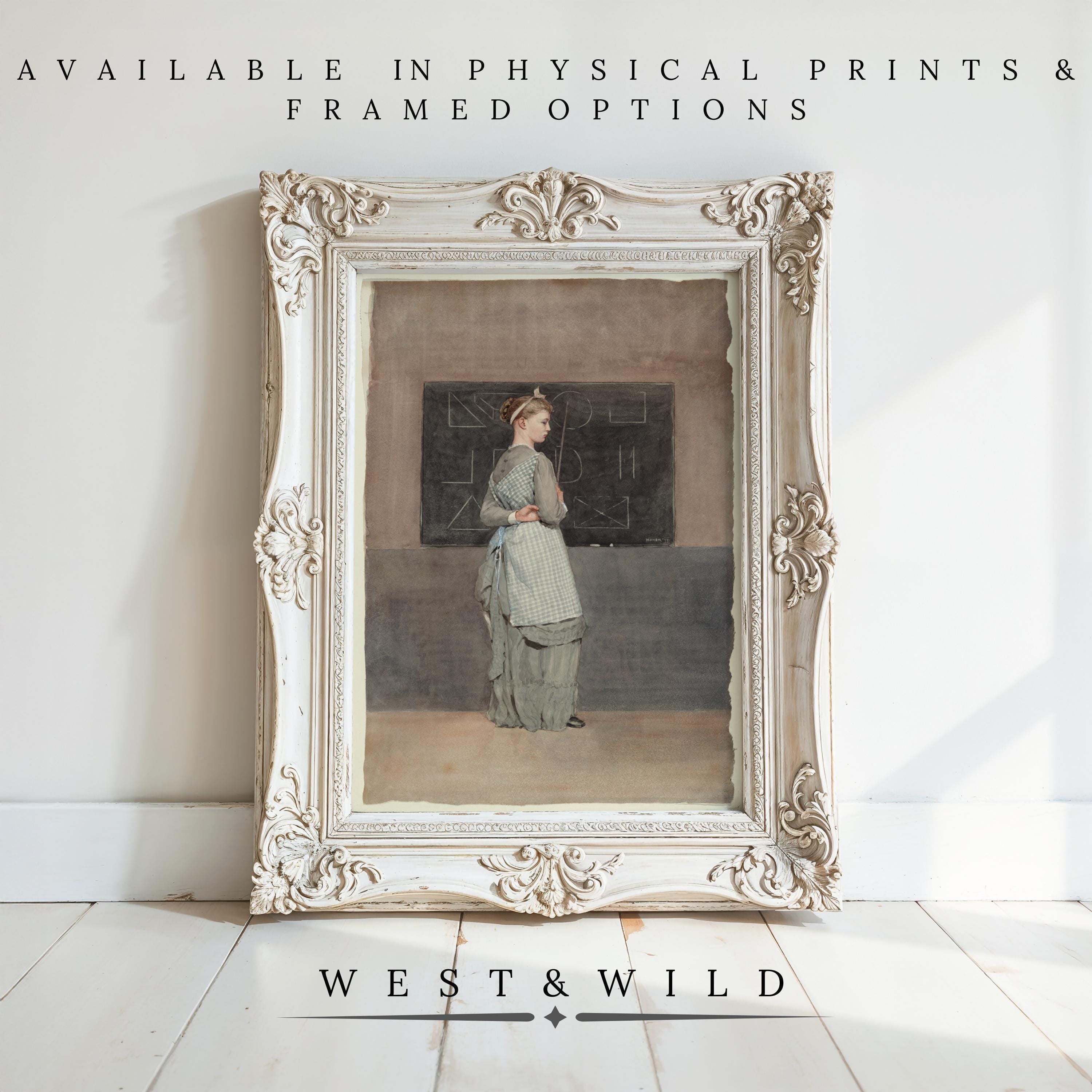 A vintage-style, ornate white frame displays the "Vintage School Painting – American Schoolhouse Art | 19th Century Classic Artwork Gift" on a wooden floor. Available as archival quality prints & framed art from West & Wild Art Archive.