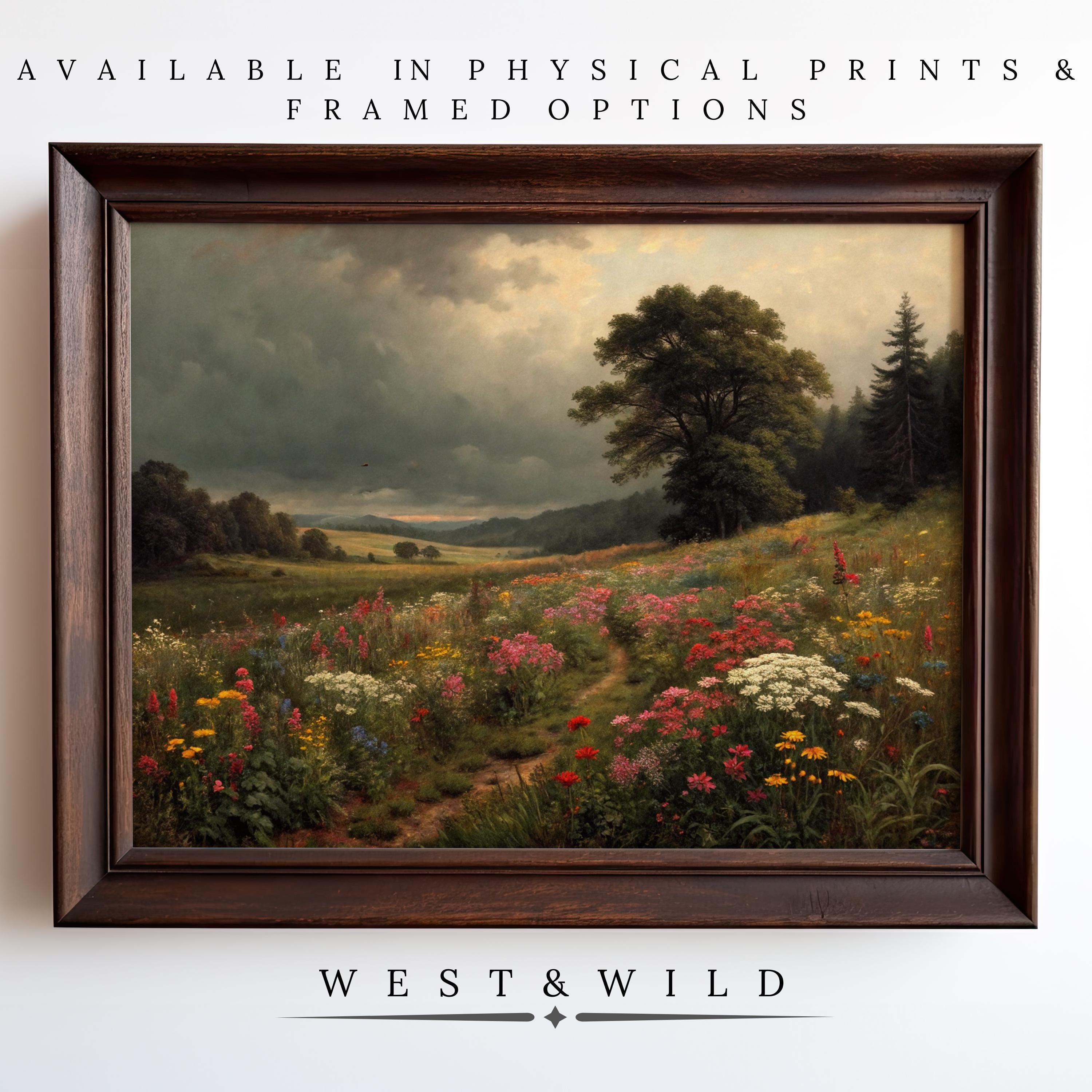 The Wildflower Art Print – Prairie Landscape features vintage wildflower blooms with trees and a cloudy sky, available as archival quality art prints and framed wall decor. “West & Wild.”.