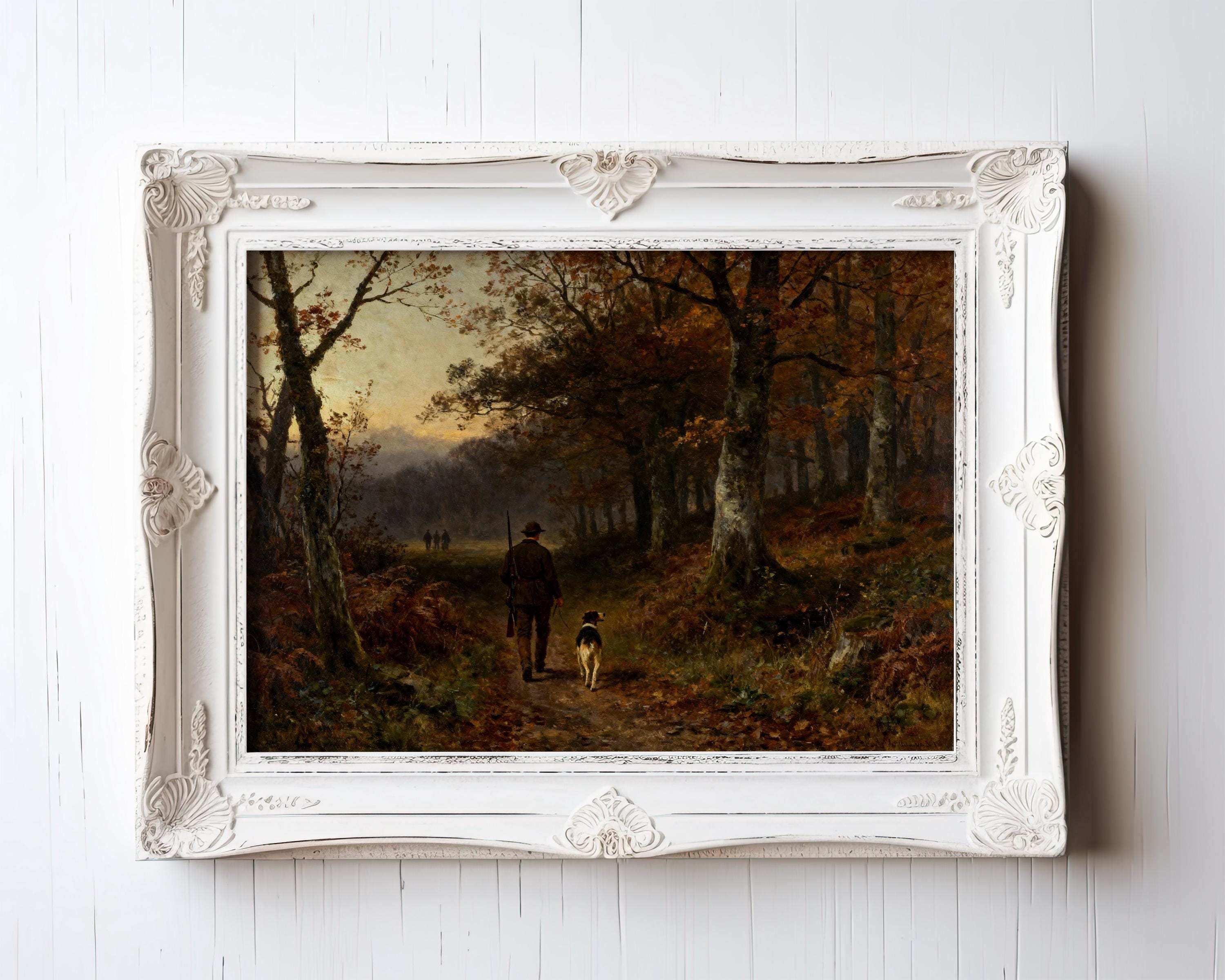 A framed "Rustic Cabin Wall Decor – Autumn Forest Print with Hunter and Dog" shows two distant figures walking along an autumn woodland path, surrounded by tall trees and earthy colors. From the West & Wild Art Archive.