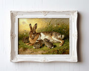 A painting of a mother rabbit with her two baby rabbits in a grassy field.