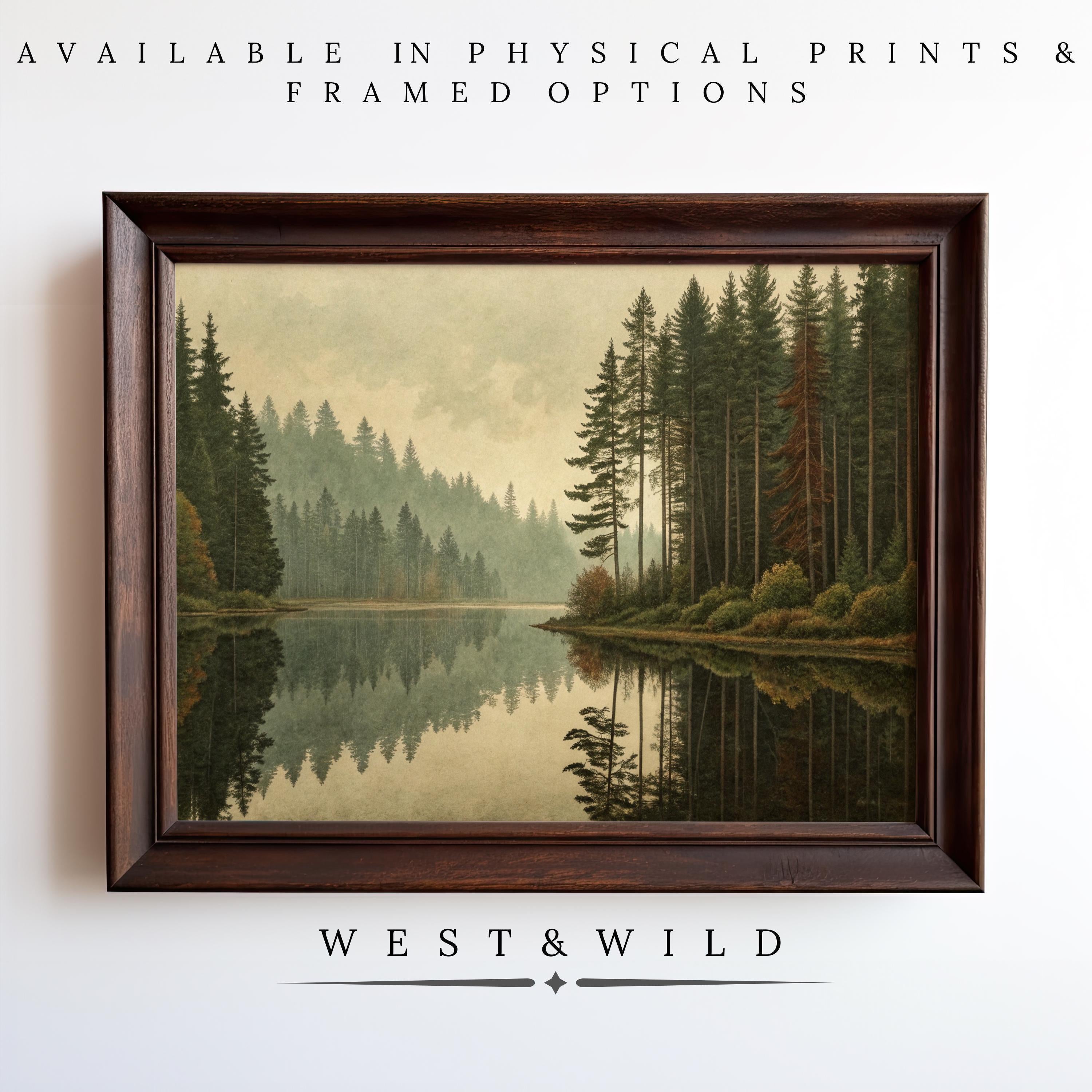 Mountain Lake Painting features a calm lake and pine trees reflected in the water. Available as vintage art prints and framed art. Part of West & Wild Art Archive’s muted color forest wall art collection.
