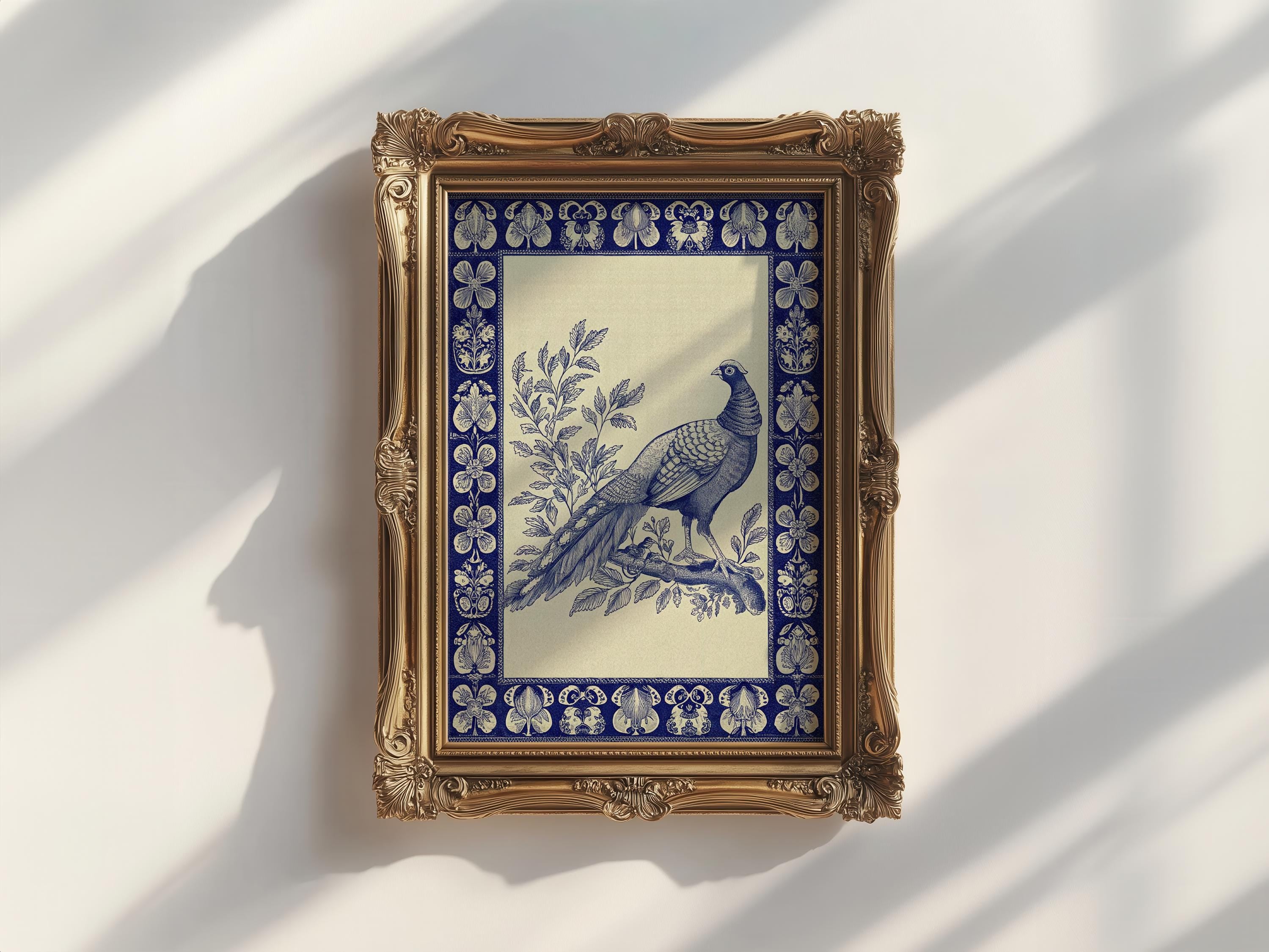 The Vintage Pheasant Wall Art features an indigo bird print with a blue border, displayed in wood metal frames. It’s a vintage art print, perfect as framed wall decor for any light-colored space.