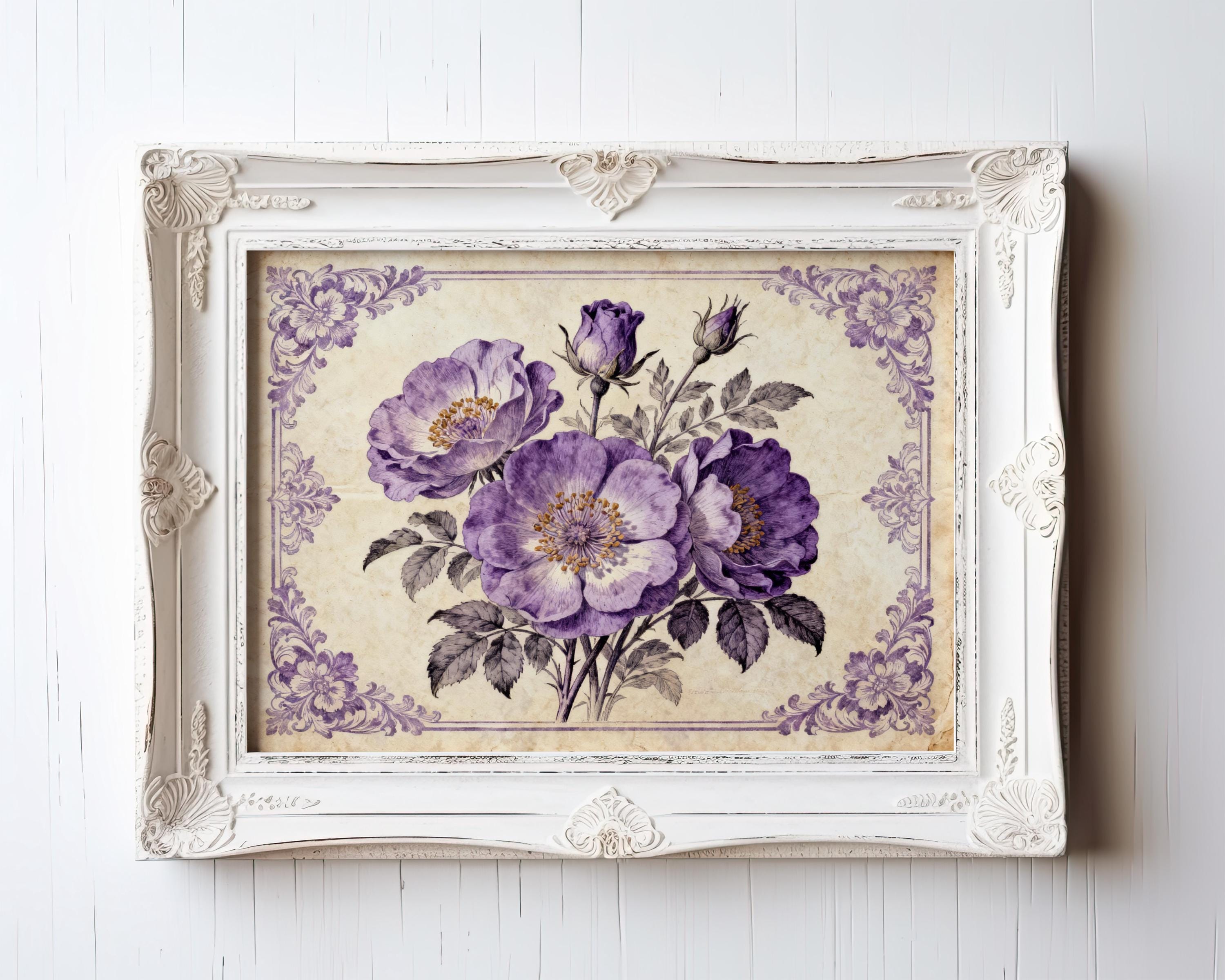 A framed painting of purple flowers is hanging on a white wall.