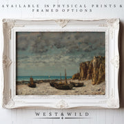 A framed Vintage Ocean Wall Art—Serene Sea Oil Painting Print with rustic frames—shows boats on a sandy shore by rocky cliffs under a cloudy sky. Available as archival-quality prints and framed art from West & Wild Art Archive.