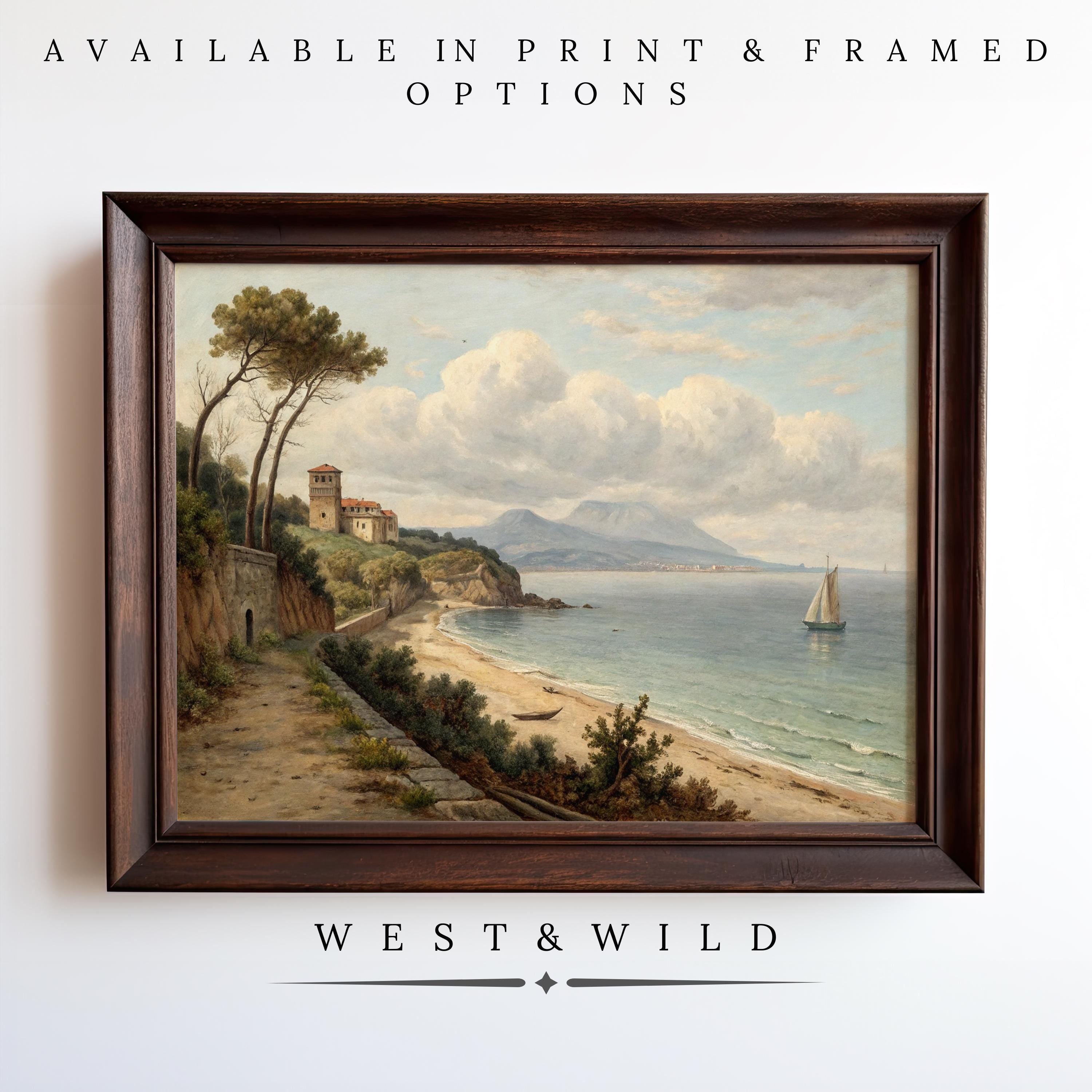 Vintage Italian Seaside Painting – Antique Framed Print features a coastal landscape with sailboat, mountains, and buildings. Archival quality print. Available in print & framed options from West & Wild Art Archive.