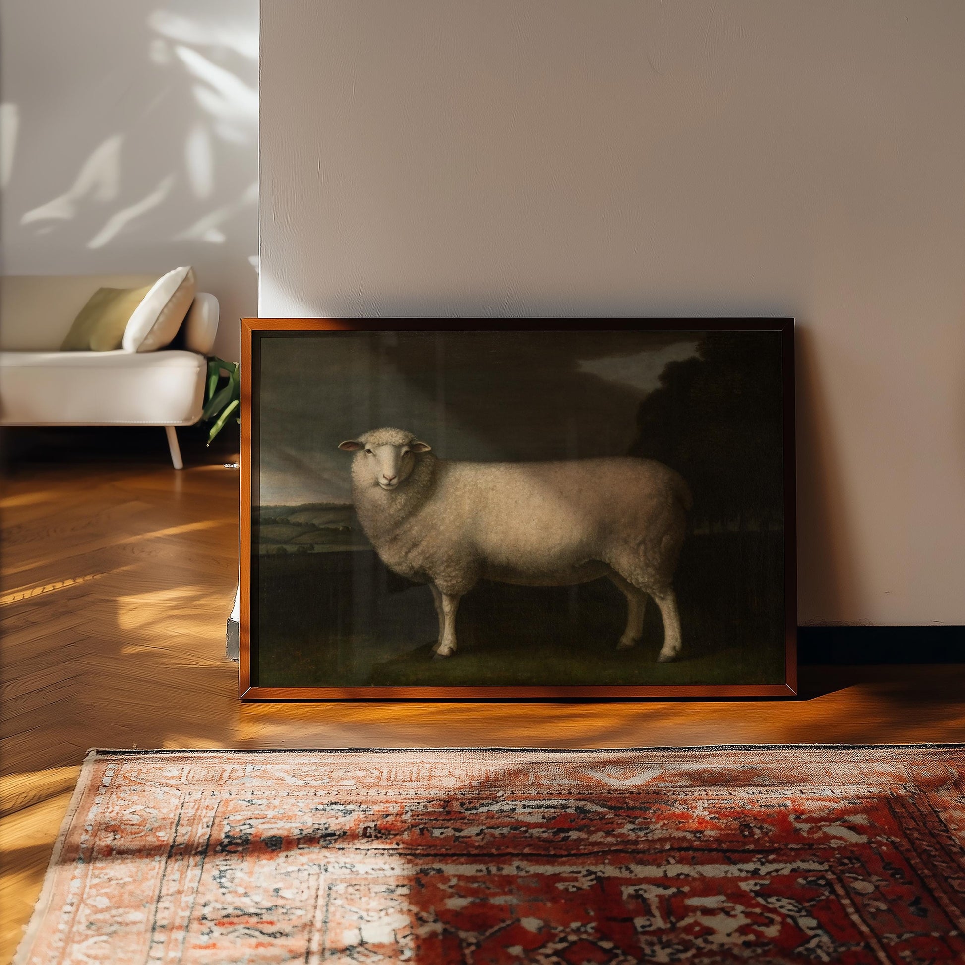 The Sheep Painting Print – Framed Vintage Country Home Artwork in Baroque Style stands against a white wall on a wooden floor, sunlight casting soft shadows beside it, completing the vintage West & Wild Art Archive look.