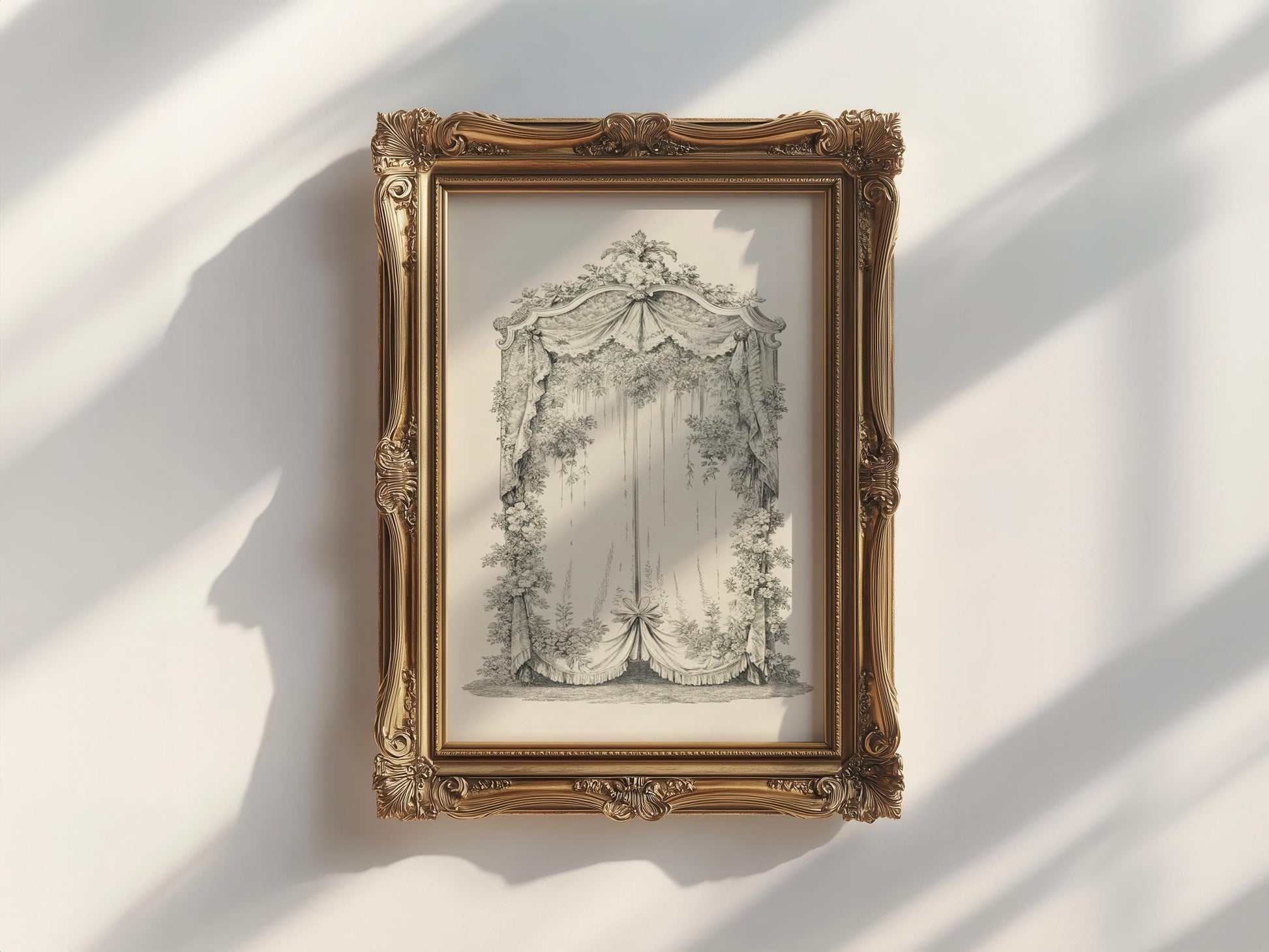 a framed artwork with an ornate, gilded frame, hanging on a white wall.