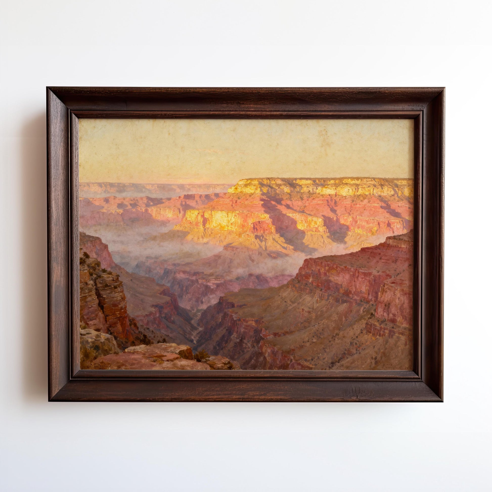 The image is a framed painting depicting a breathtaking view of the Grand Canyon, with its vibrant colors and dramatic landscape.