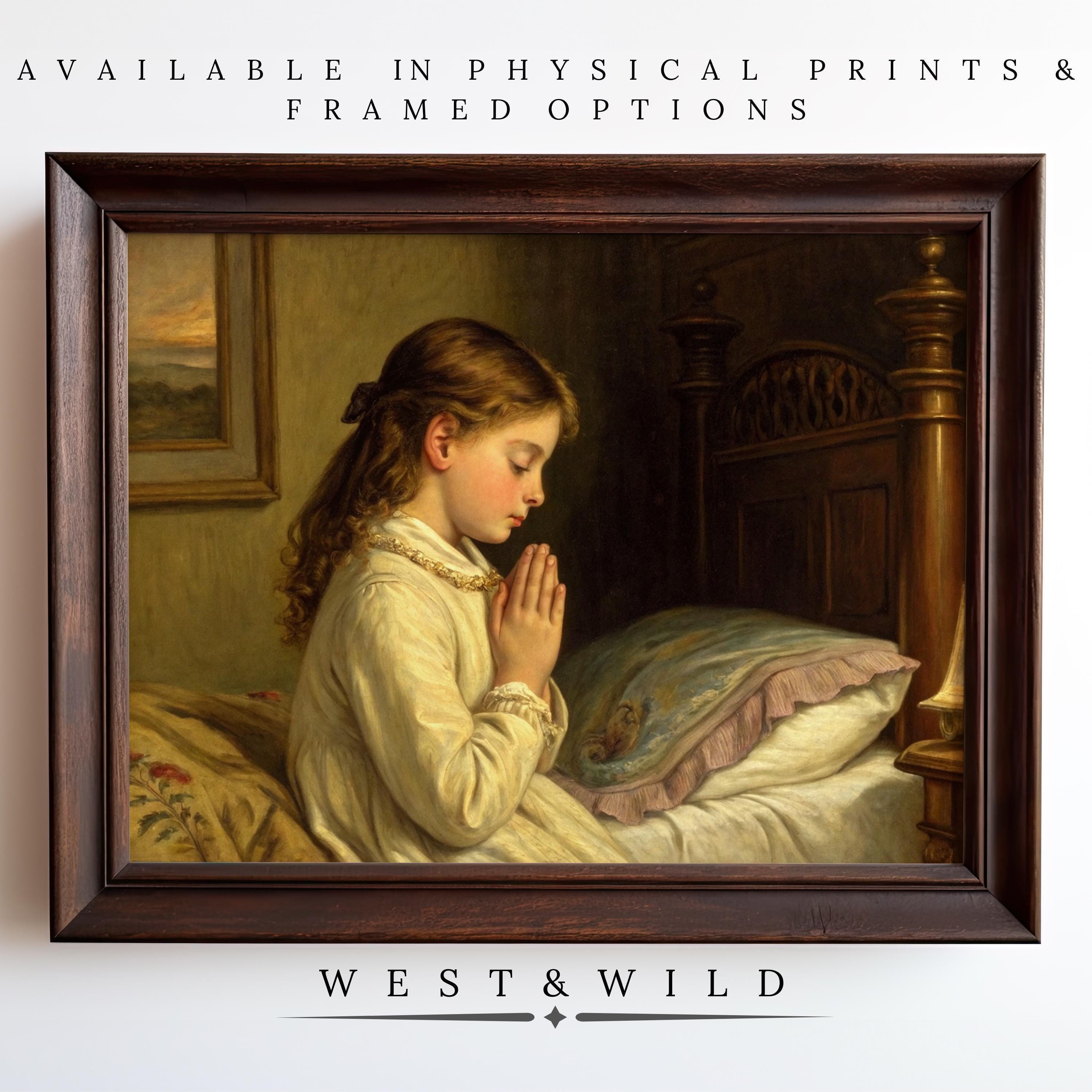 A Christian Themed Art print—Victorian Religious Wall Decor—features a young girl praying beside her bed. Archival quality. Available as vintage art prints & framed art from the West & Wild Art Archive; ideal for girls’ rooms or faith gifts.