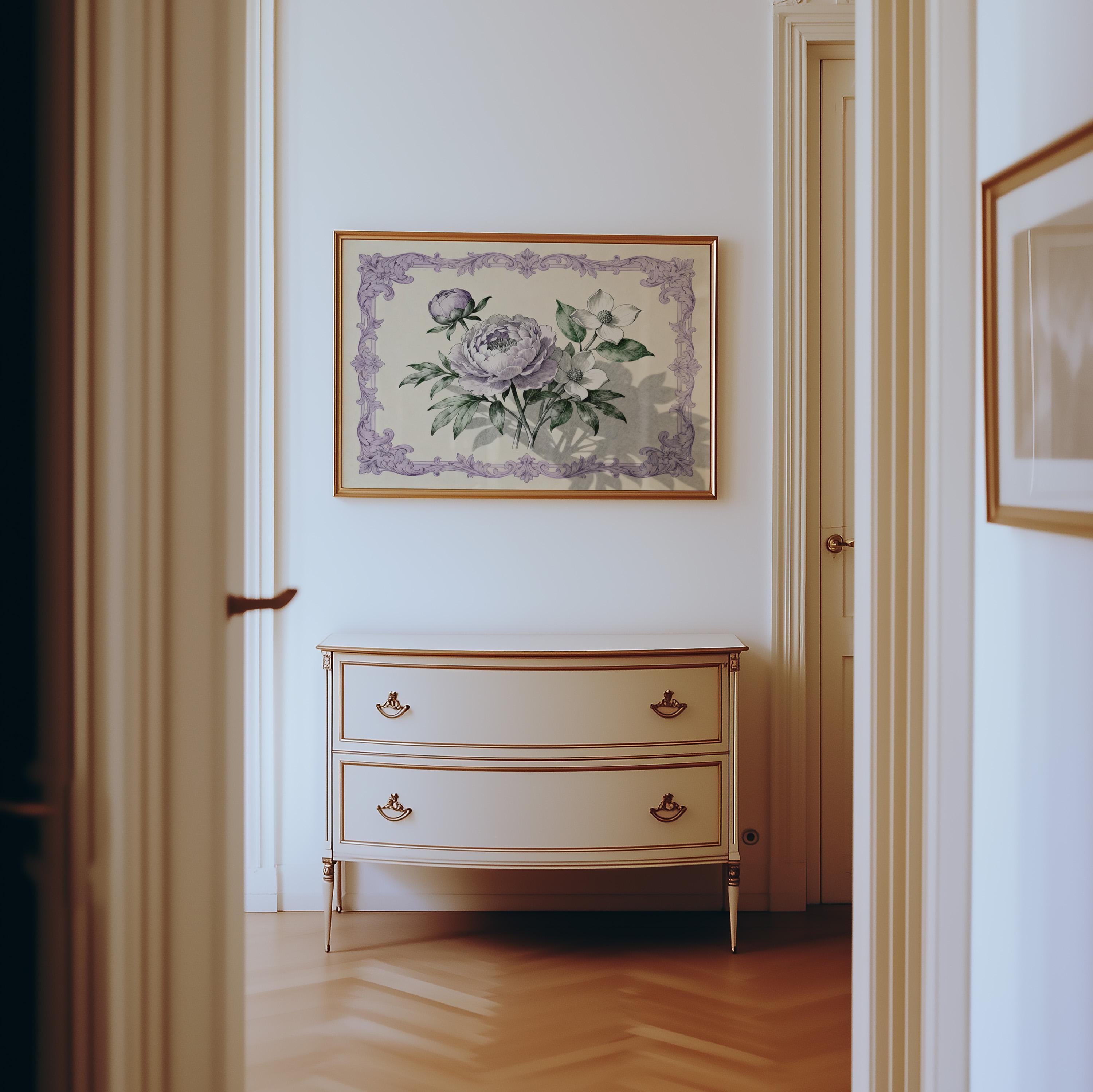 a hallway with a white dresser and a framed floral artwork hanging on the wall above it.