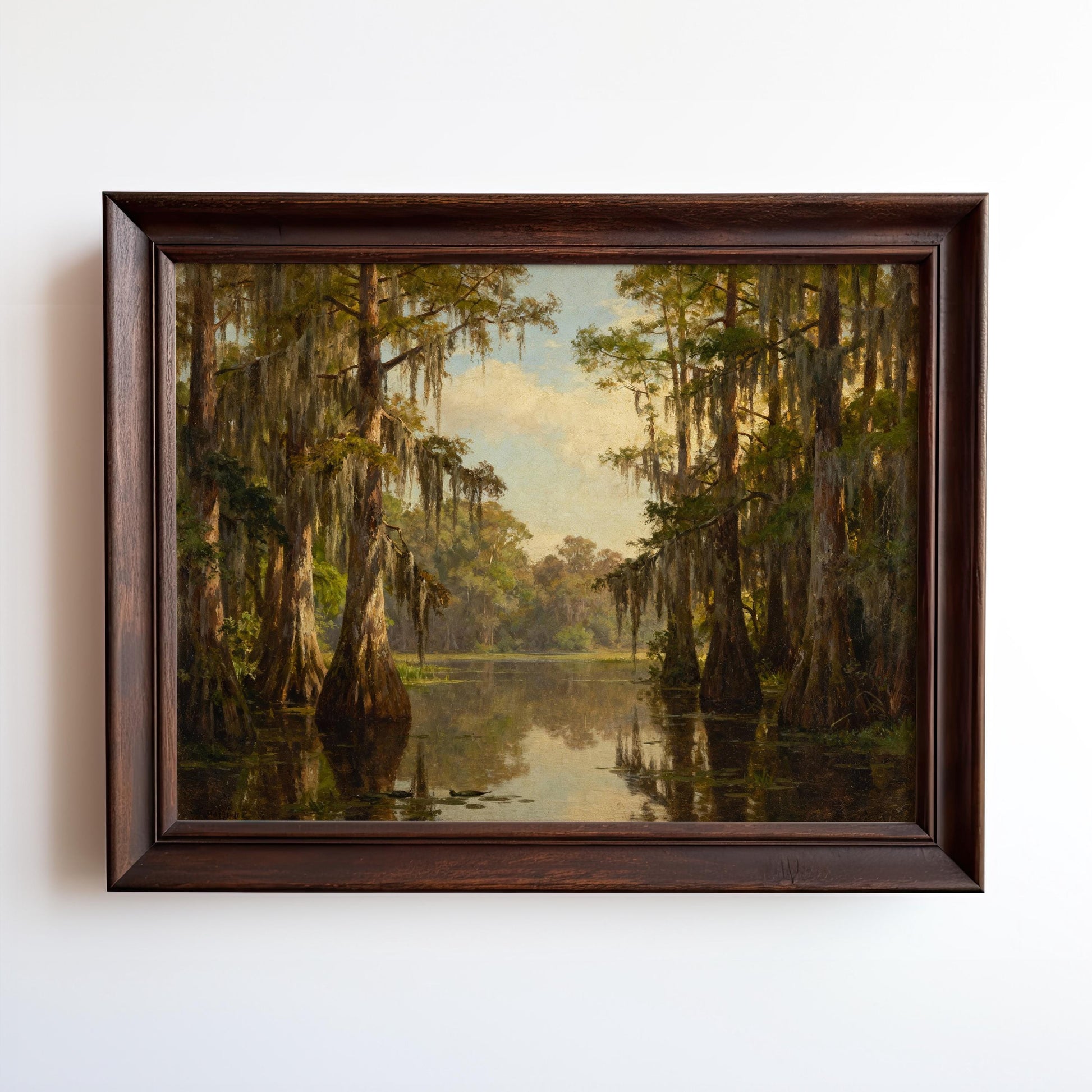 A Vintage Swamp Landscape Print – Cypress Tree Art | Framed Nature Print, featuring cypress trees draped in Spanish moss over calm water, hangs on a white wall—an archival quality piece from West & Wild Art Archive.