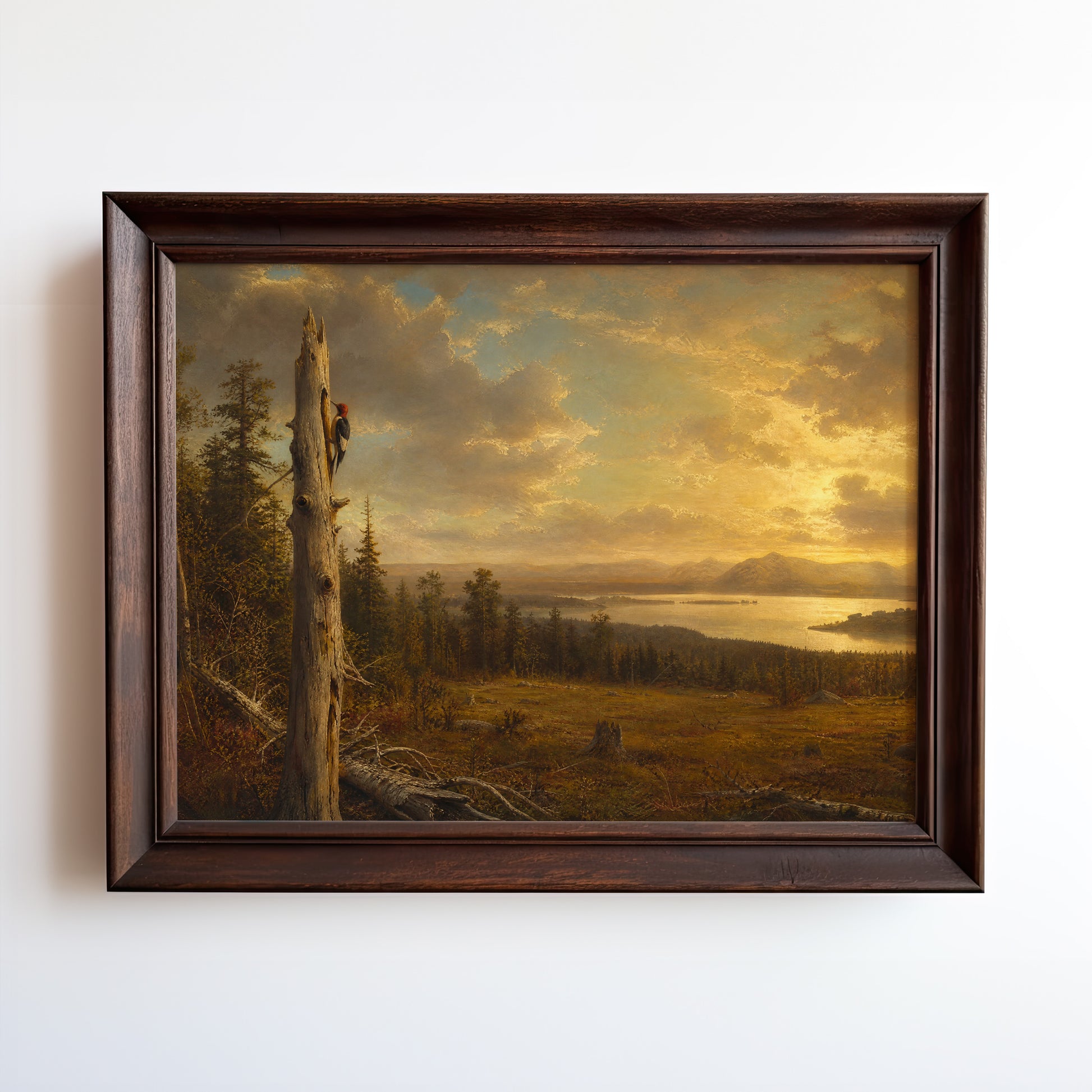 Oil painting of a woodpecker on a weathered snag above a golden-hour lake valley landscape