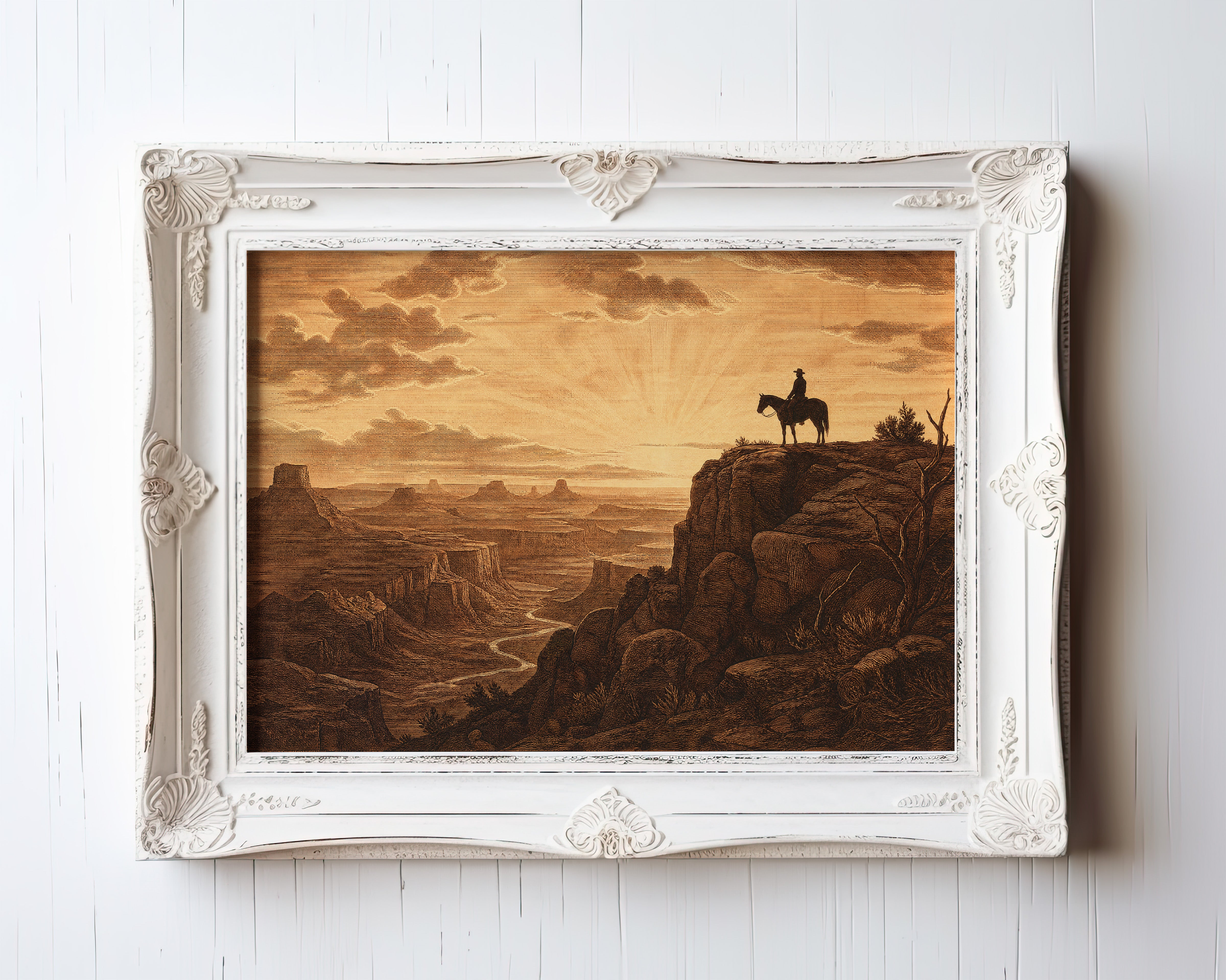 Etching-style print of a cowboy on horseback silhouetted against a sunrise canyon — view 3