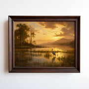 Oil painting of a heron wading in a golden marsh at sunrise with distant mountains