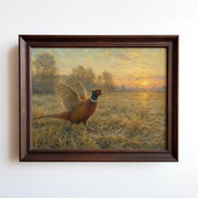 Oil painting of a pheasant in a harvested grain field at golden sunrise