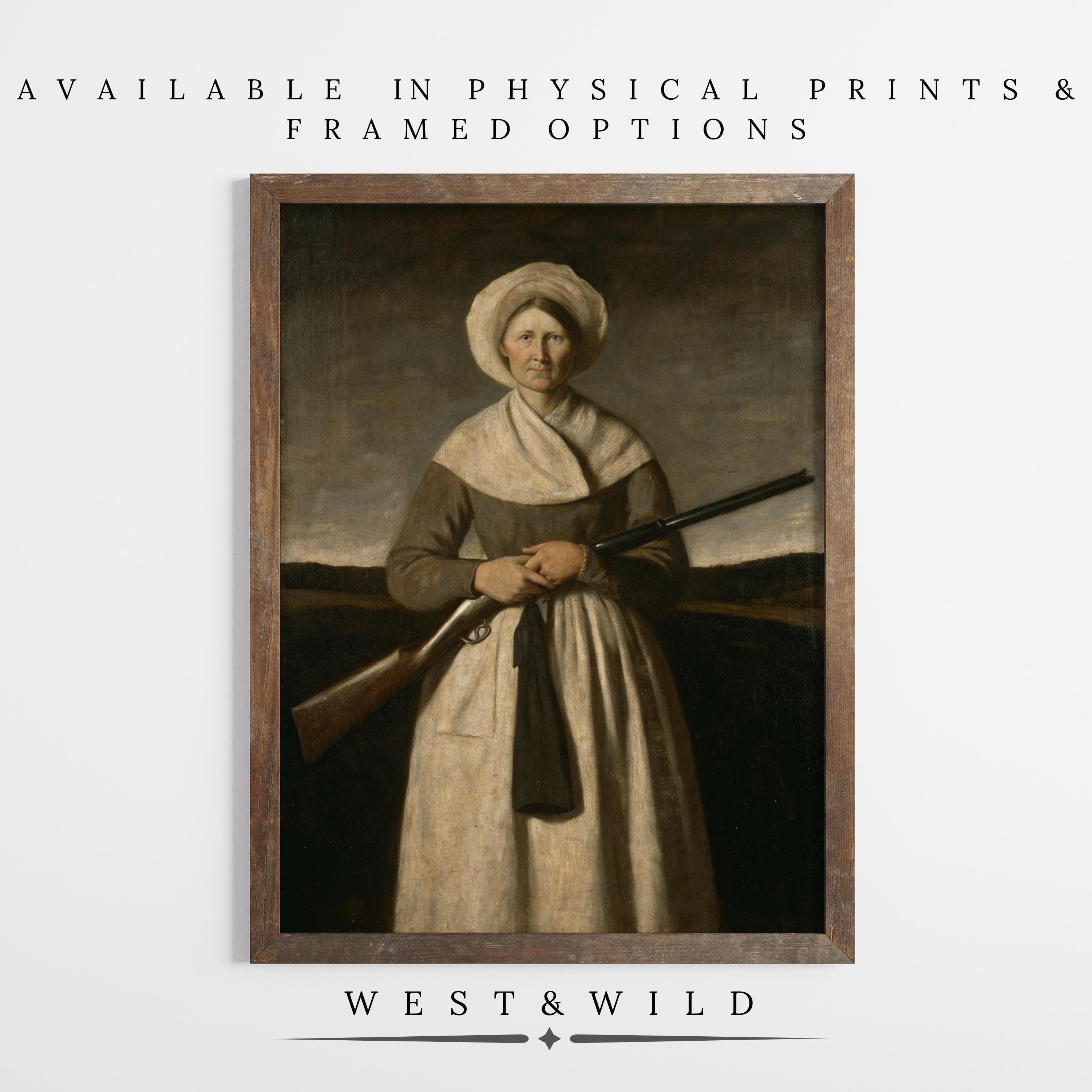 A framed "Vintage Woman Rifle Art – Rustic Pioneer Decor | 19th Century Portrait Print" features a woman in historical attire with a rifle, displayed on a white wall. "Available in prints & framed options" is above; "WEST & WILD" appears below.