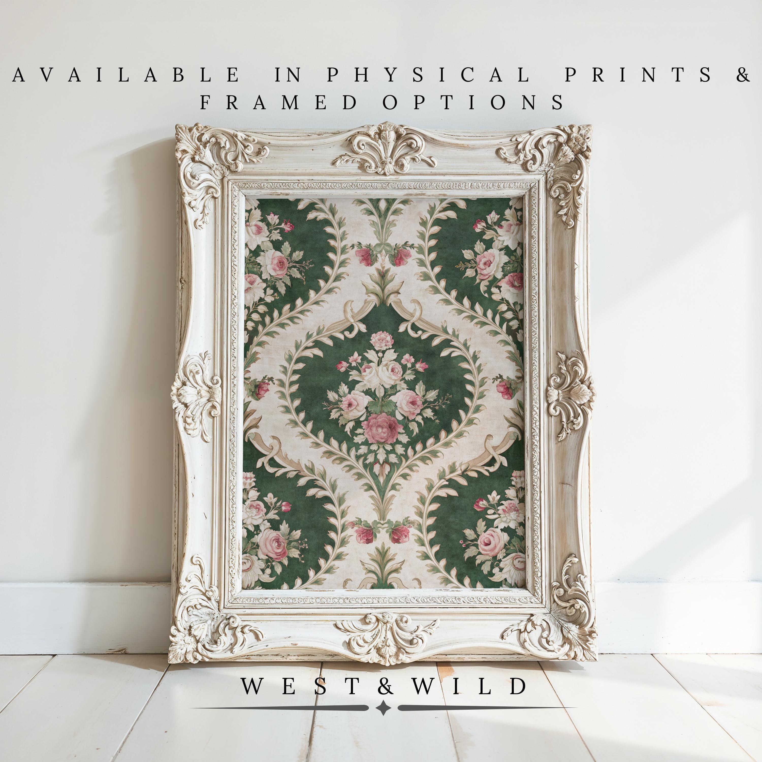 The Vintage Botanical Wall Art – Framed Botanical Wall Art features pink roses and green leaves in an ornate white vintage frame. Available as physical prints and framed options from West & Wild, it adds classic charm to any room.