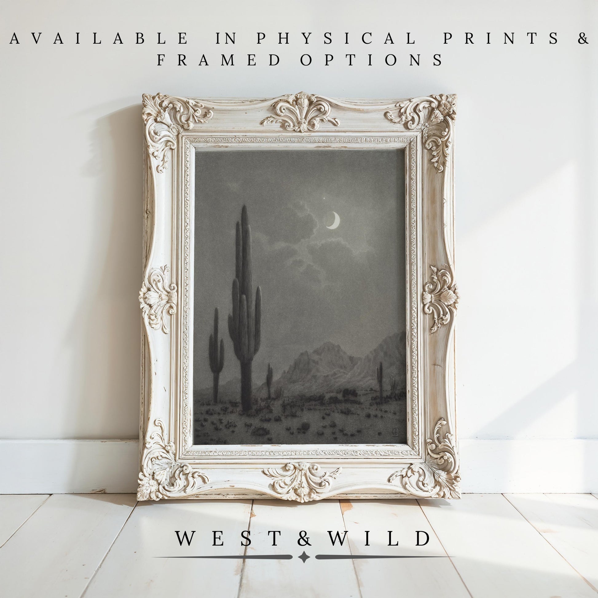 The Desert Landscape Art | Vintage Southwestern Wall Art features a moody black and white desert scene with cacti and a crescent moon. This archival quality vintage art print is available as physical prints and framed art from the West & Wild Art Archive.