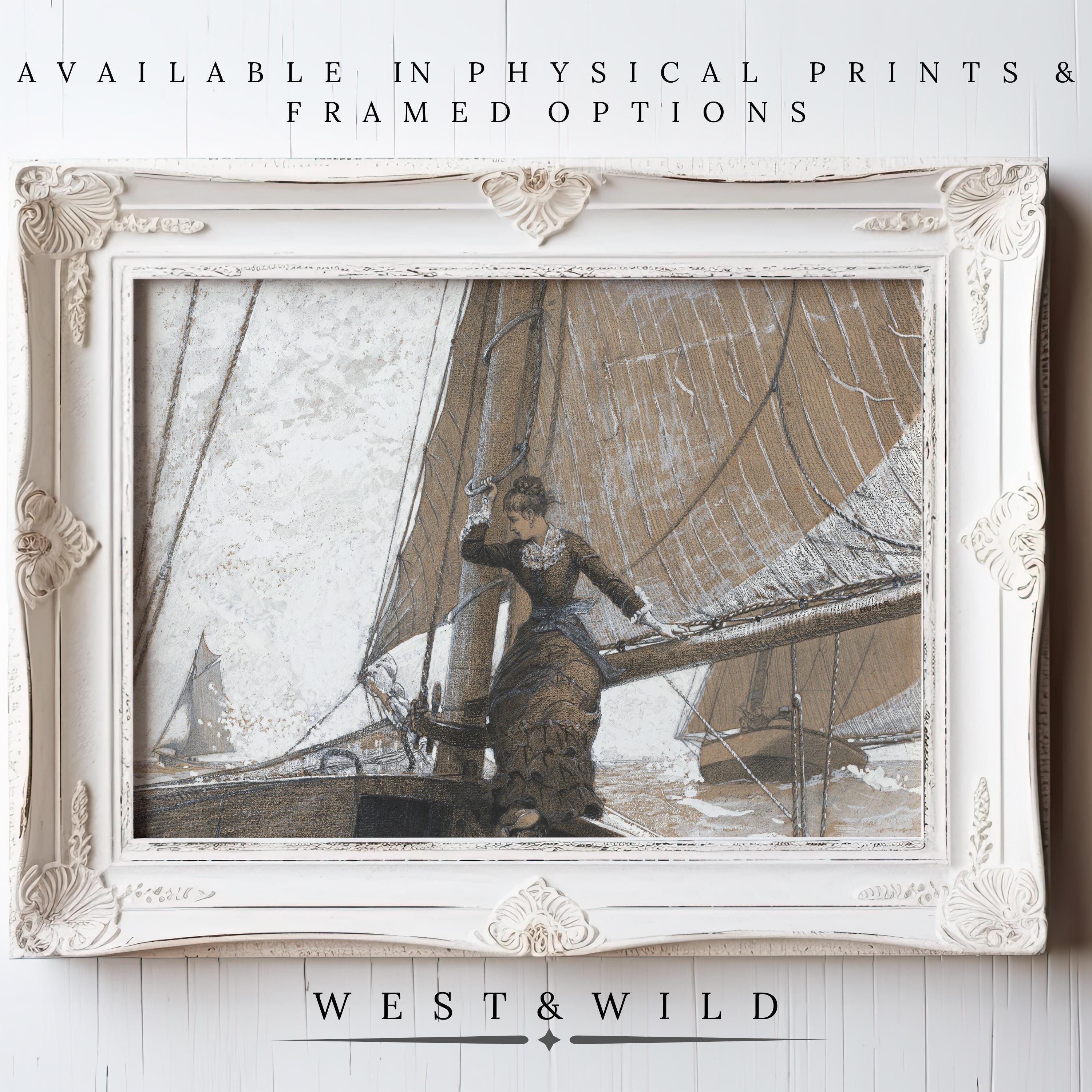 The Vintage Sailing Wall Art – Classic Nautical Prints | Victorian Home Decor features a woman on a sailboat with billowing sails in an ornate white frame against a white wood background. Available as archival quality prints and framed art.