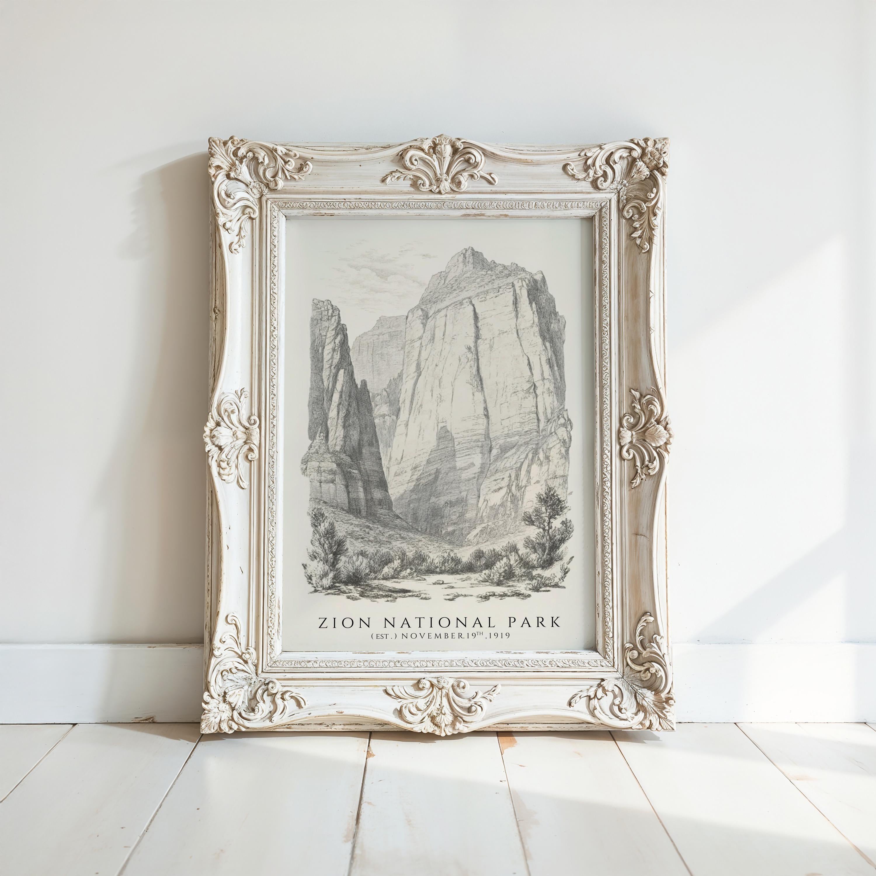 a framed illustration of a mountainous landscape, with the text "Zion National Park" prominently displayed.