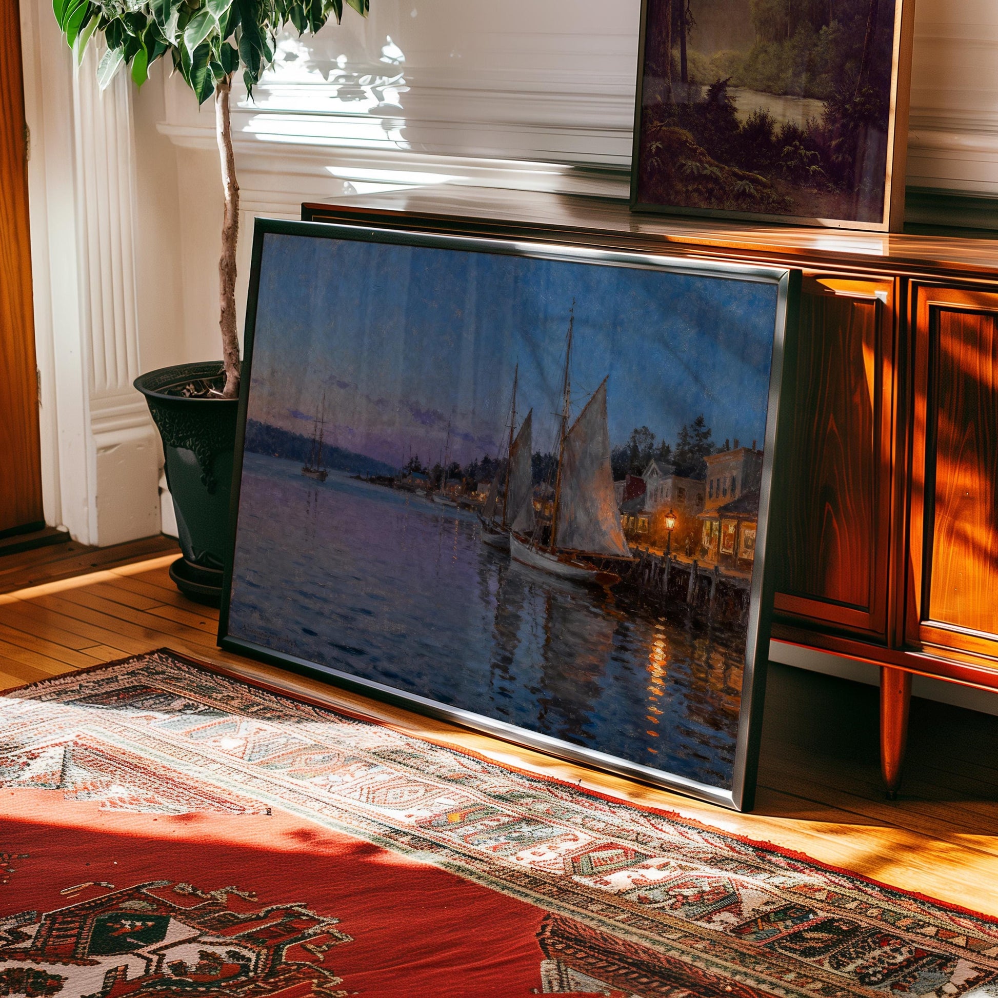 a large framed painting depicting a serene harbor scene with sailboats and buildings reflected in the water.