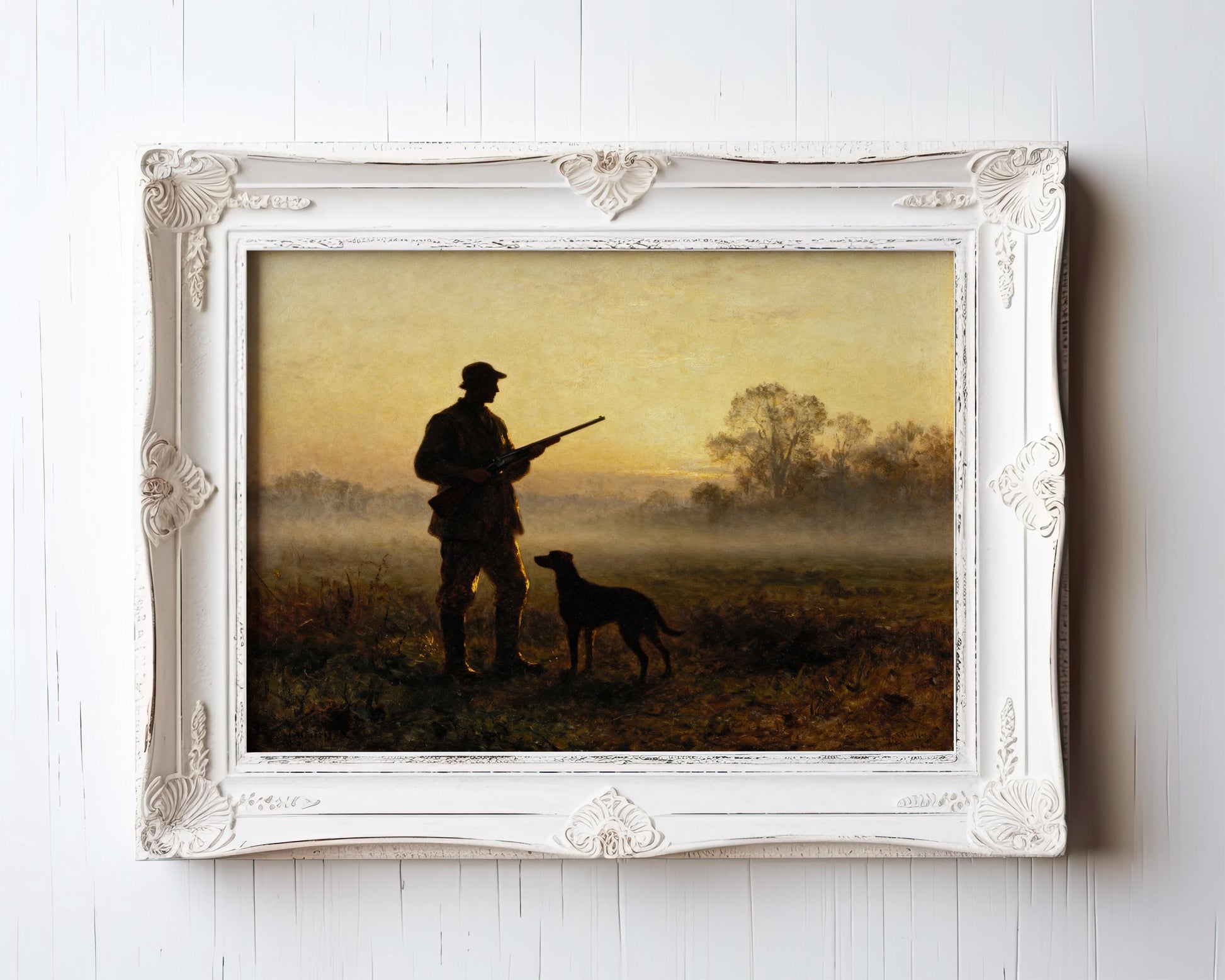 A painting of a man with a rifle and a dog in a field at sunset, with a white frame.
