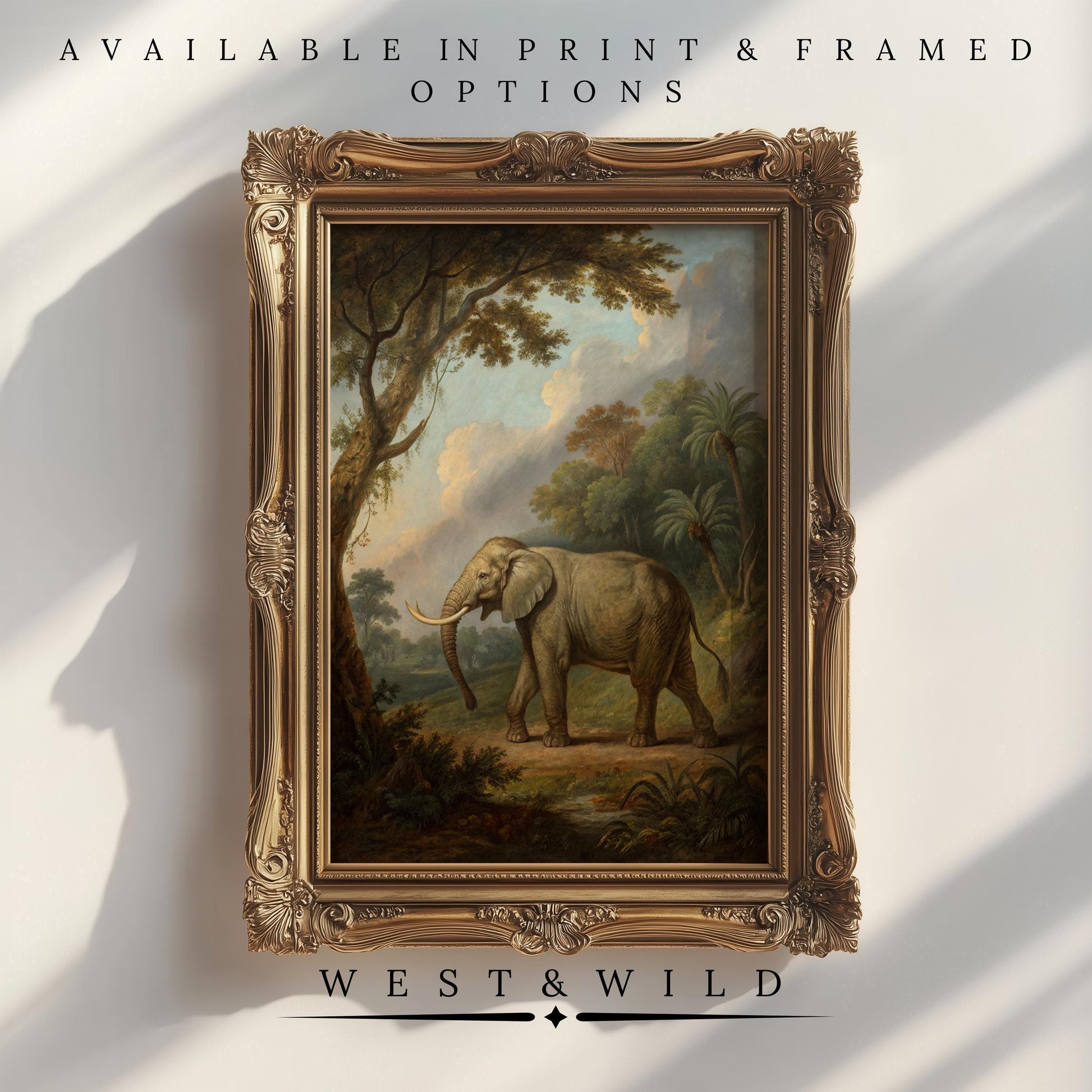 A framed Elephant Art Print—Vintage Elephant Prints Framed Wall Art With Jungle Painting—hangs on the wall. WEST & WILD: part of the West & Wild Art Archive, available as a Vintage Art Print or framed art.