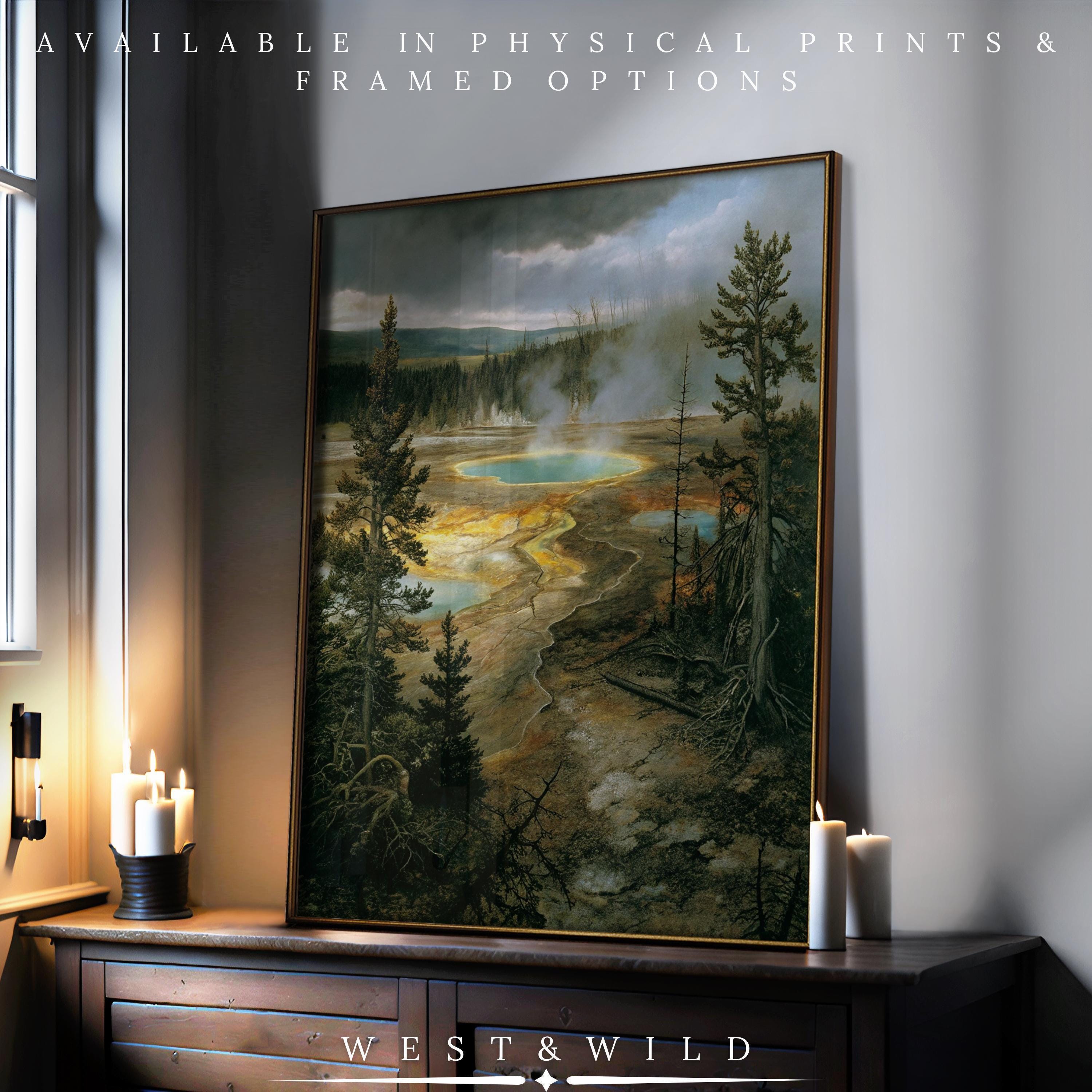 A Yellowstone National Park Art - Montana Landscape Print hangs above a dark wooden dresser with candles. This vintage art print is available as museum-grade, archival quality prints and framed wall decor at WEST & WILD.
