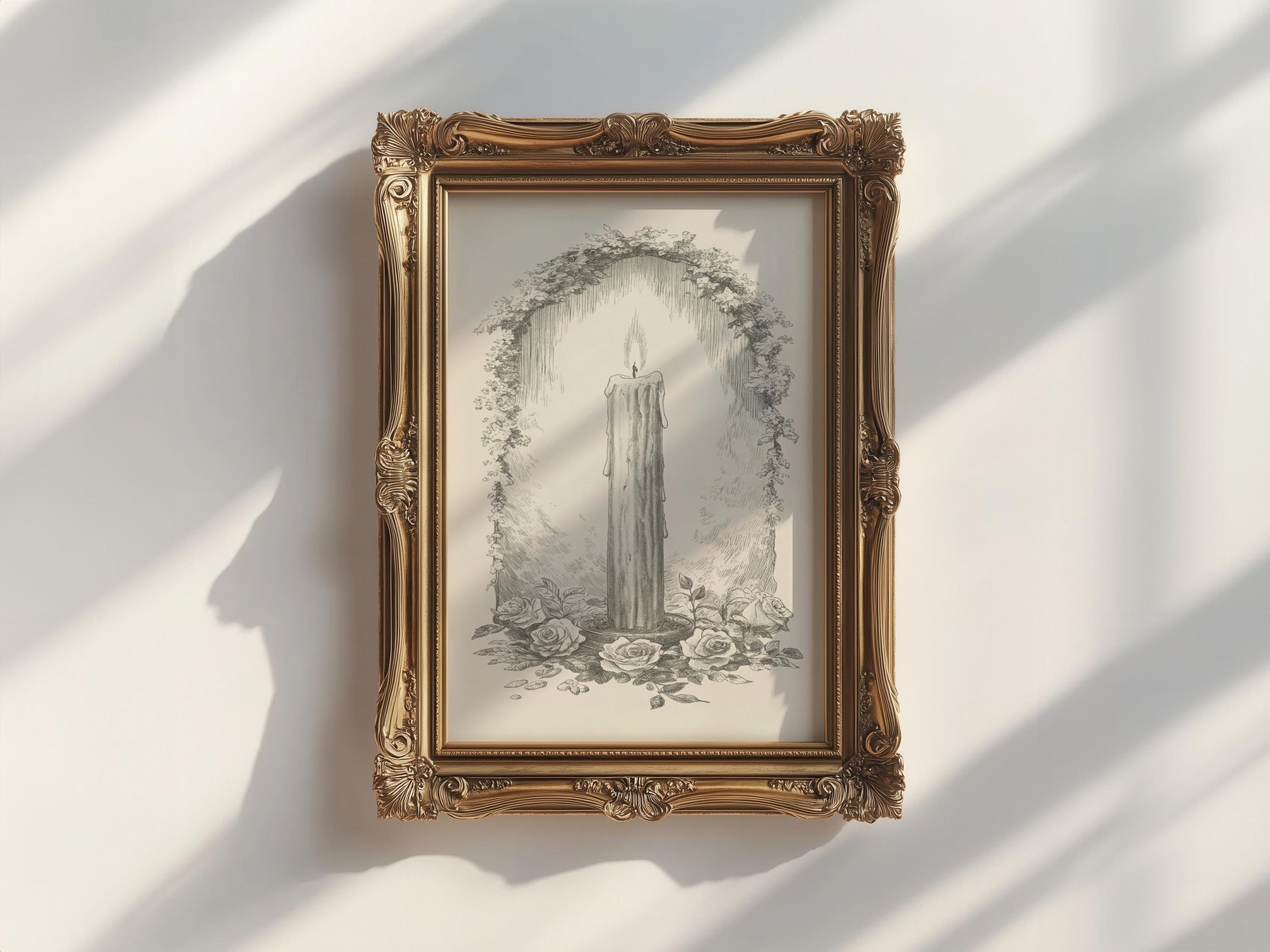 A framed drawing of a candle surrounded by flowers and foliage, hanging on a white wall.