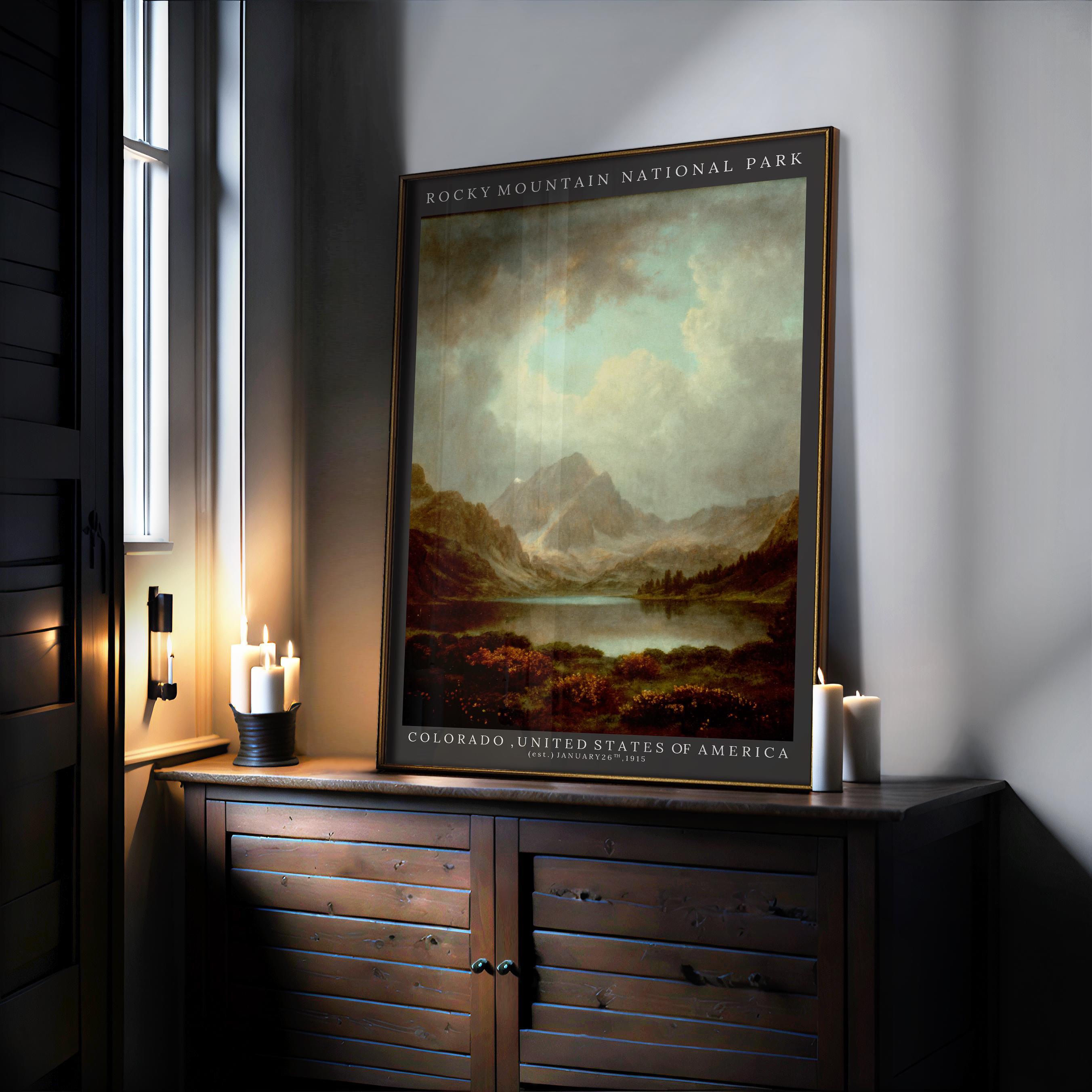 The Rocky Mountain National Park Print – Vintage Forest Art adds charm to your rustic cabin decor, displayed on a dark cabinet beside glowing candles and bathed in gentle natural light from a nearby window.