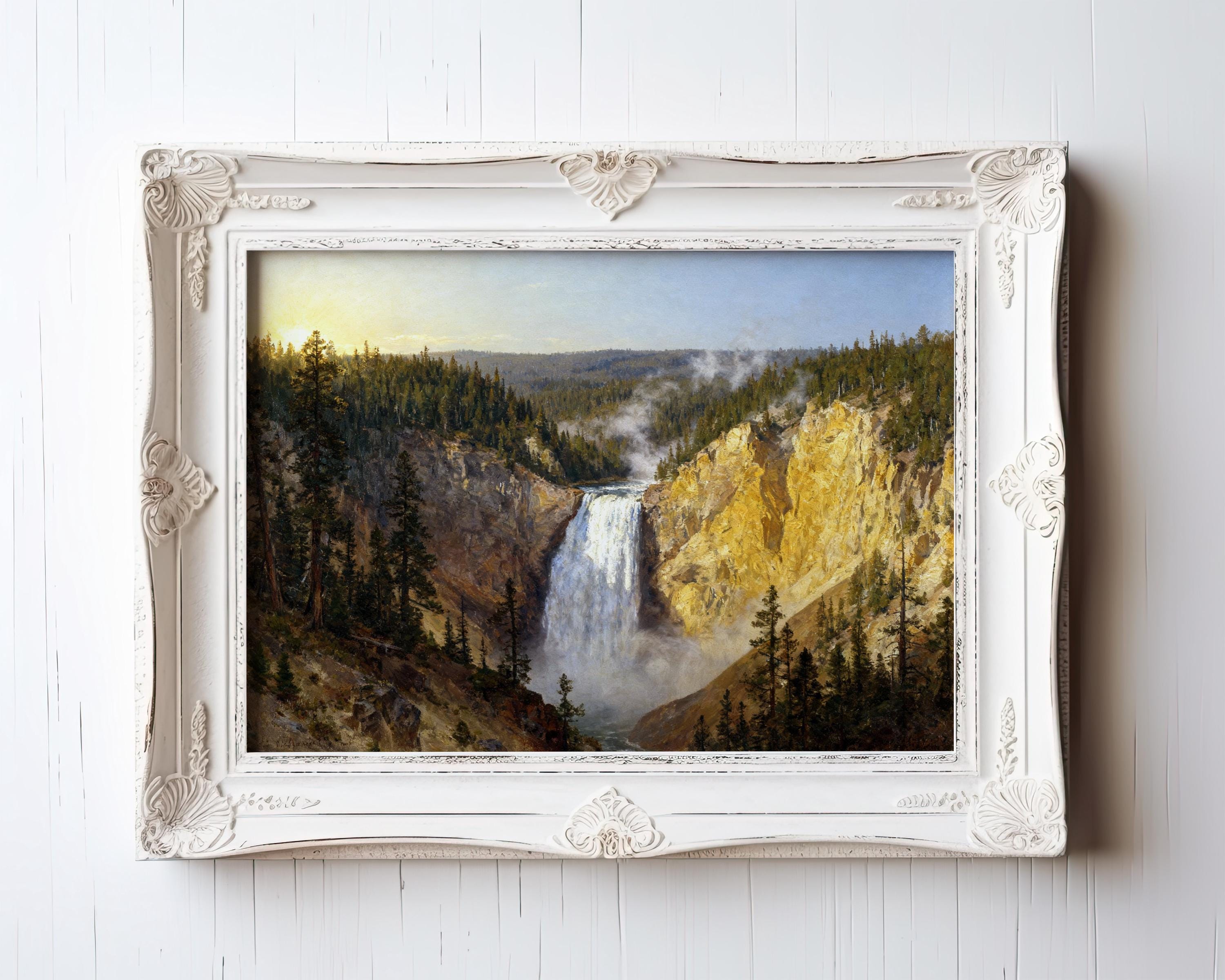 A framed painting depicting a scenic waterfall surrounded by lush green trees and a mountainous landscape.