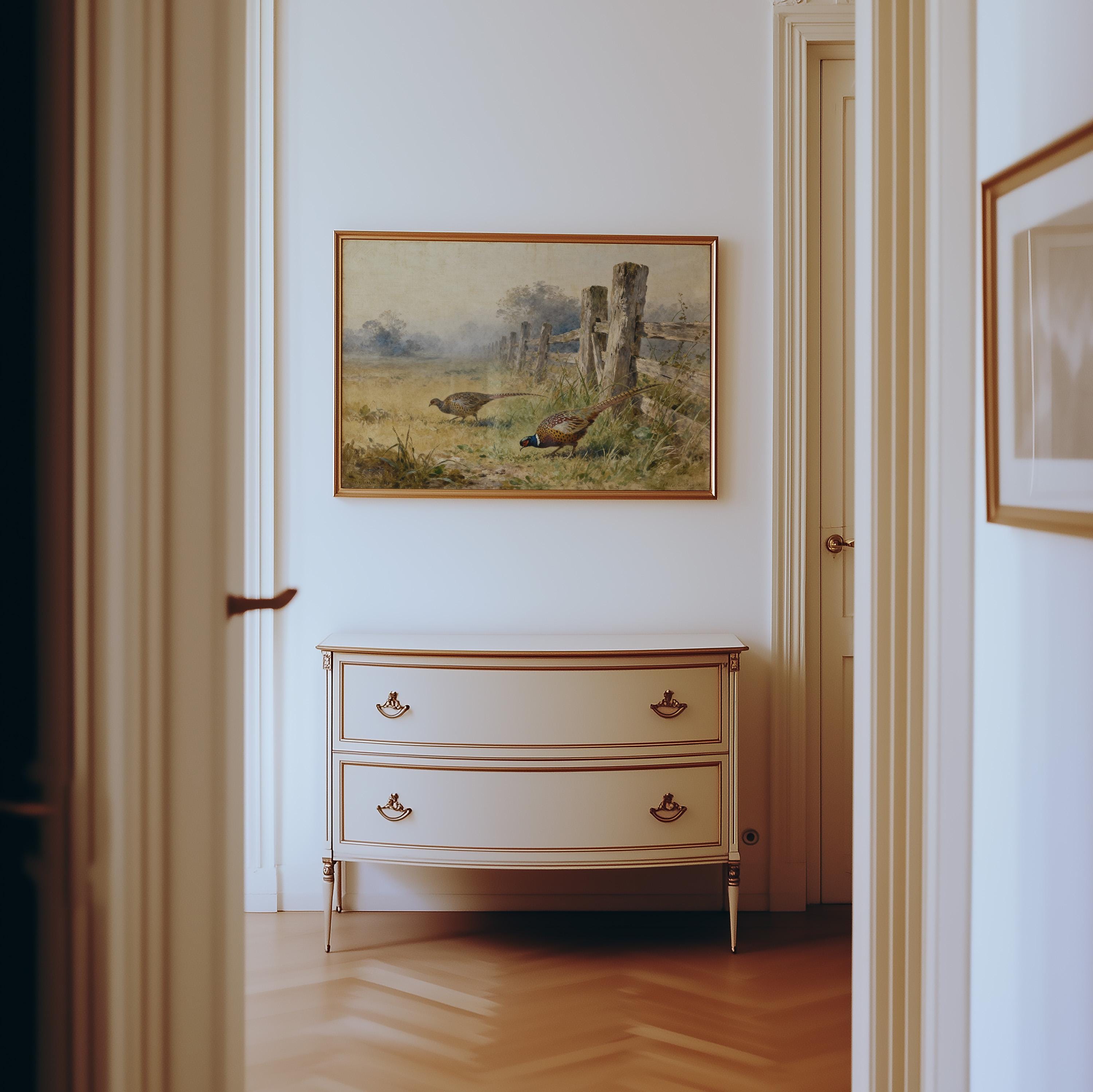 a hallway with a painting of a field and two birds hanging on the wall above a white dresser with two drawers.