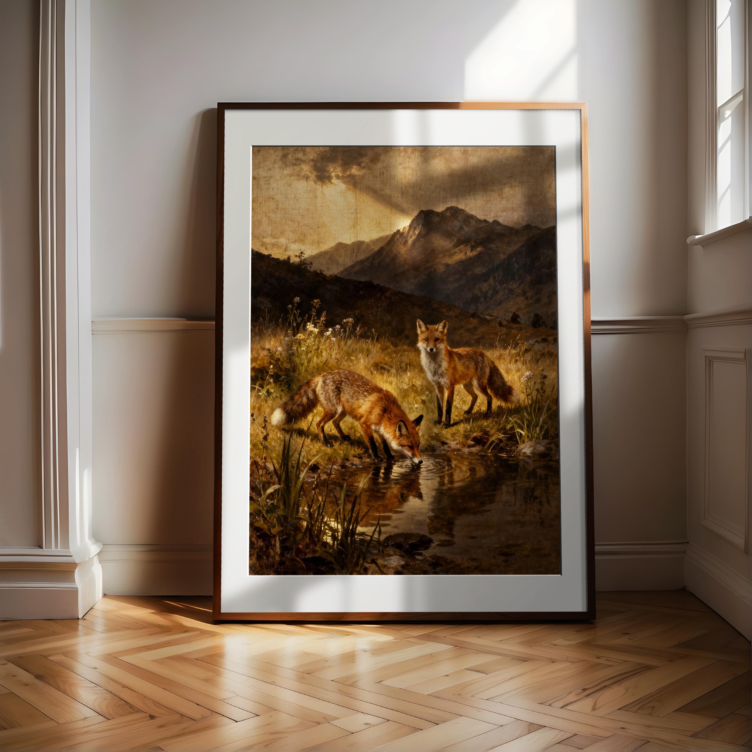 A framed painting depicting two foxes in a grassy field, with mountains in the background.