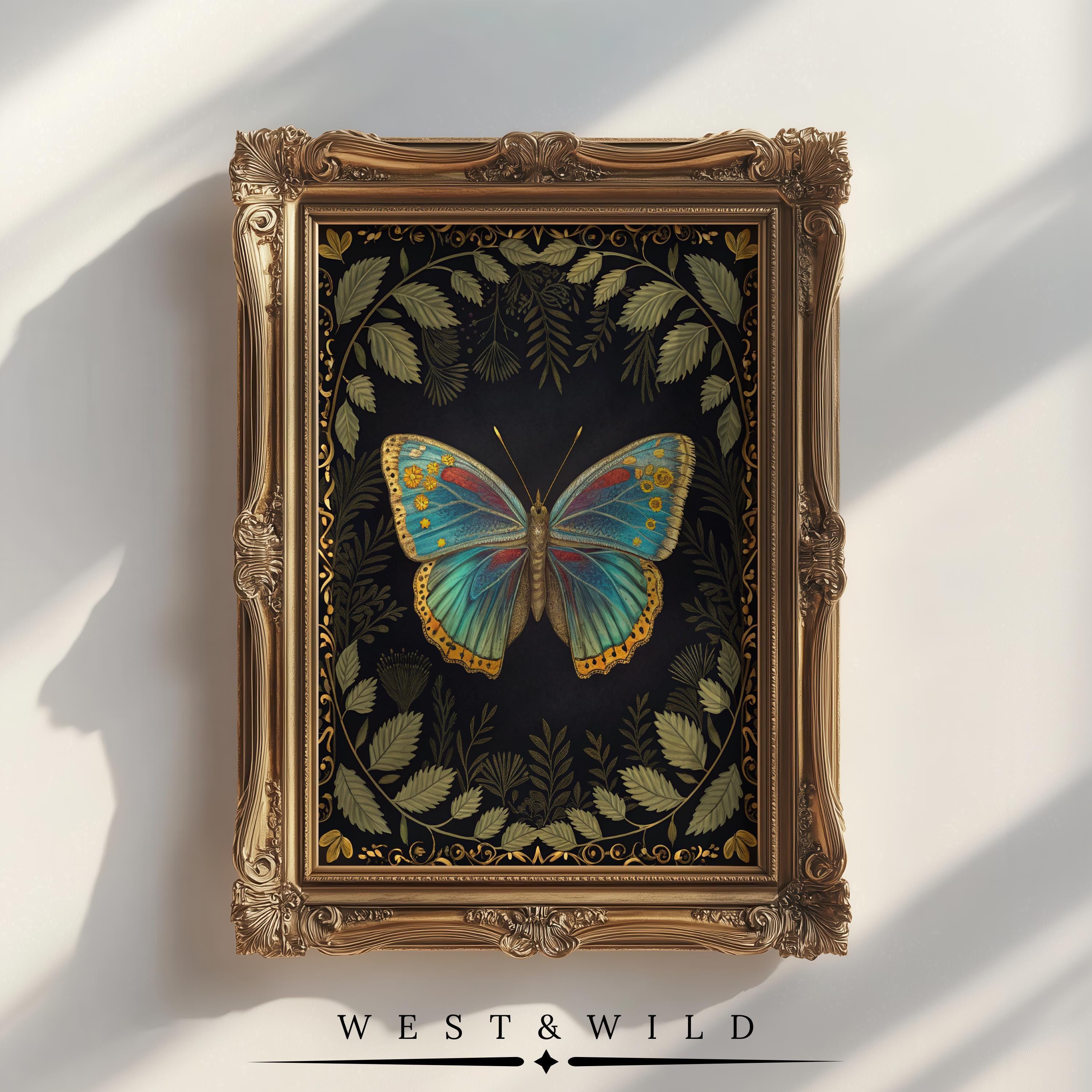 A gold-framed Butterfly Wall Art features a moody botanical illustration of a colorful butterfly with blue and yellow wings, surrounded by golden leaves on black. WEST & WILD is written below, part of the West & Wild Art Archive.