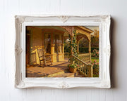 A painting of a porch with a rocking chair, surrounded by lush greenery and flowers, set against a serene landscape.