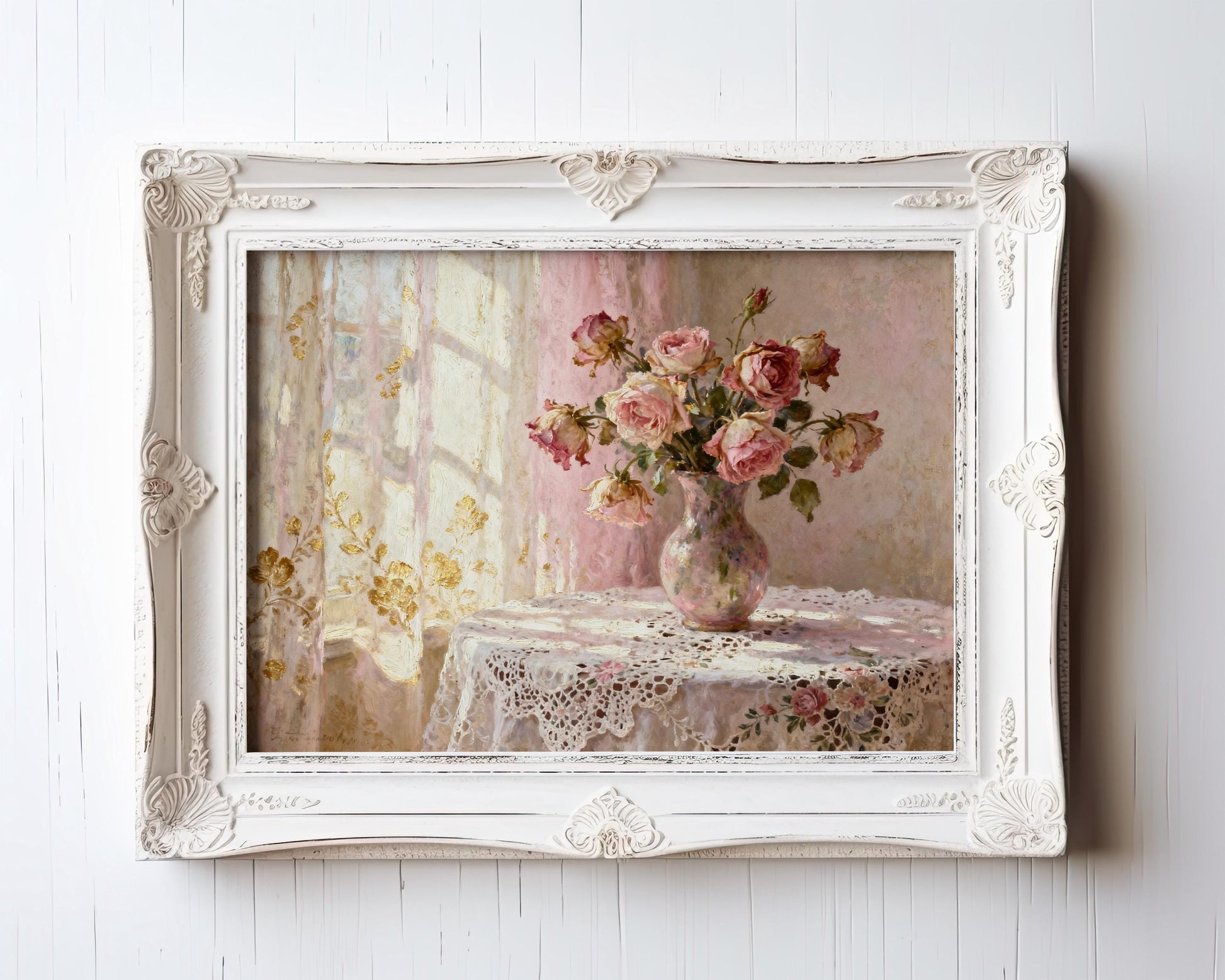 A framed painting depicting a vase of pink roses on a lace tablecloth, set against a window with white curtains.