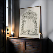 a large, ornate, and detailed drawing of a curtain or drape, displayed on a wooden cabinet or dresser. The drawing is framed and placed on a shelf or table, with two candles in a holder to the left of the frame.