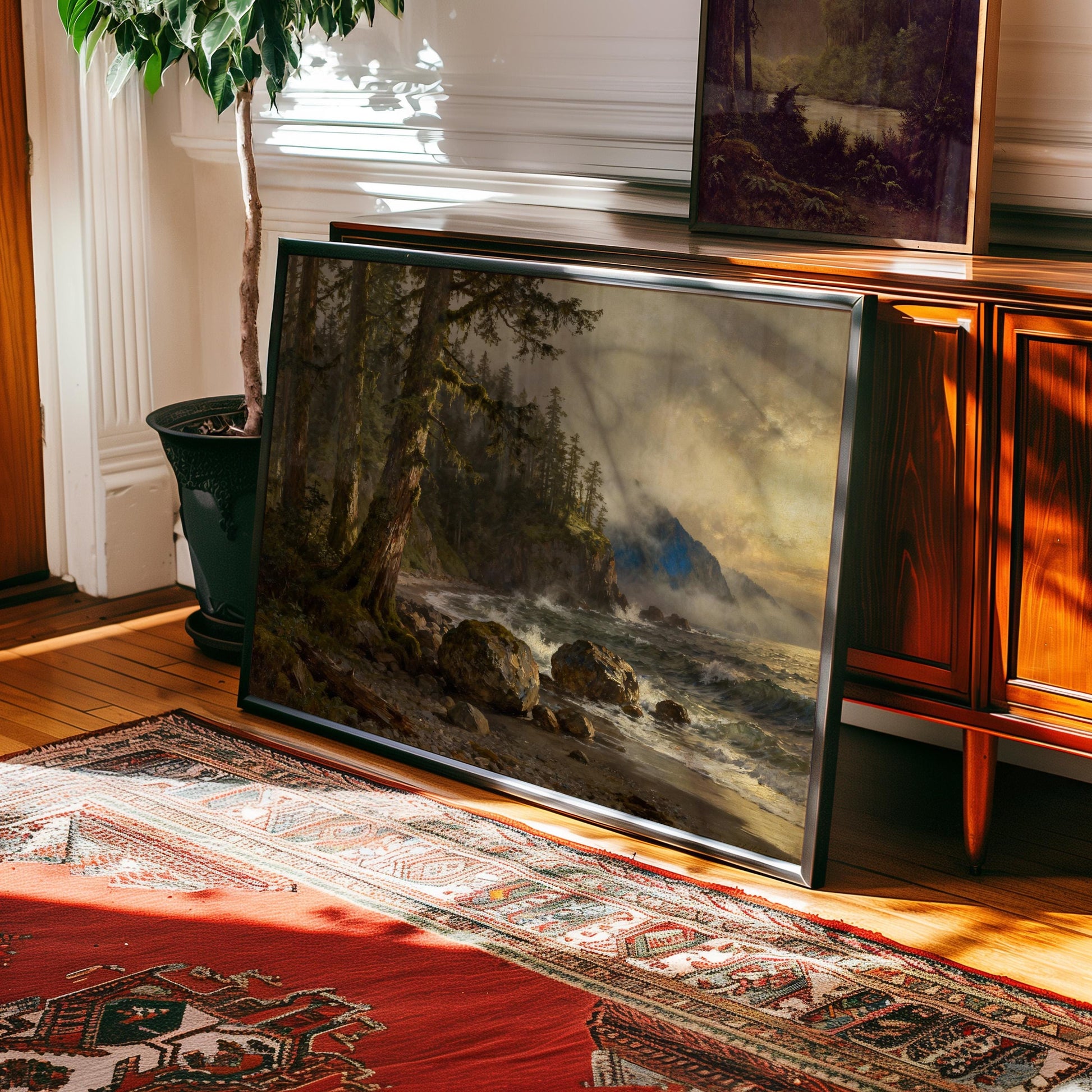 a large framed painting depicting a serene landscape with a forest, a body of water, and a cloudy sky. The painting is placed on a wooden floor, with a rug underneath it.